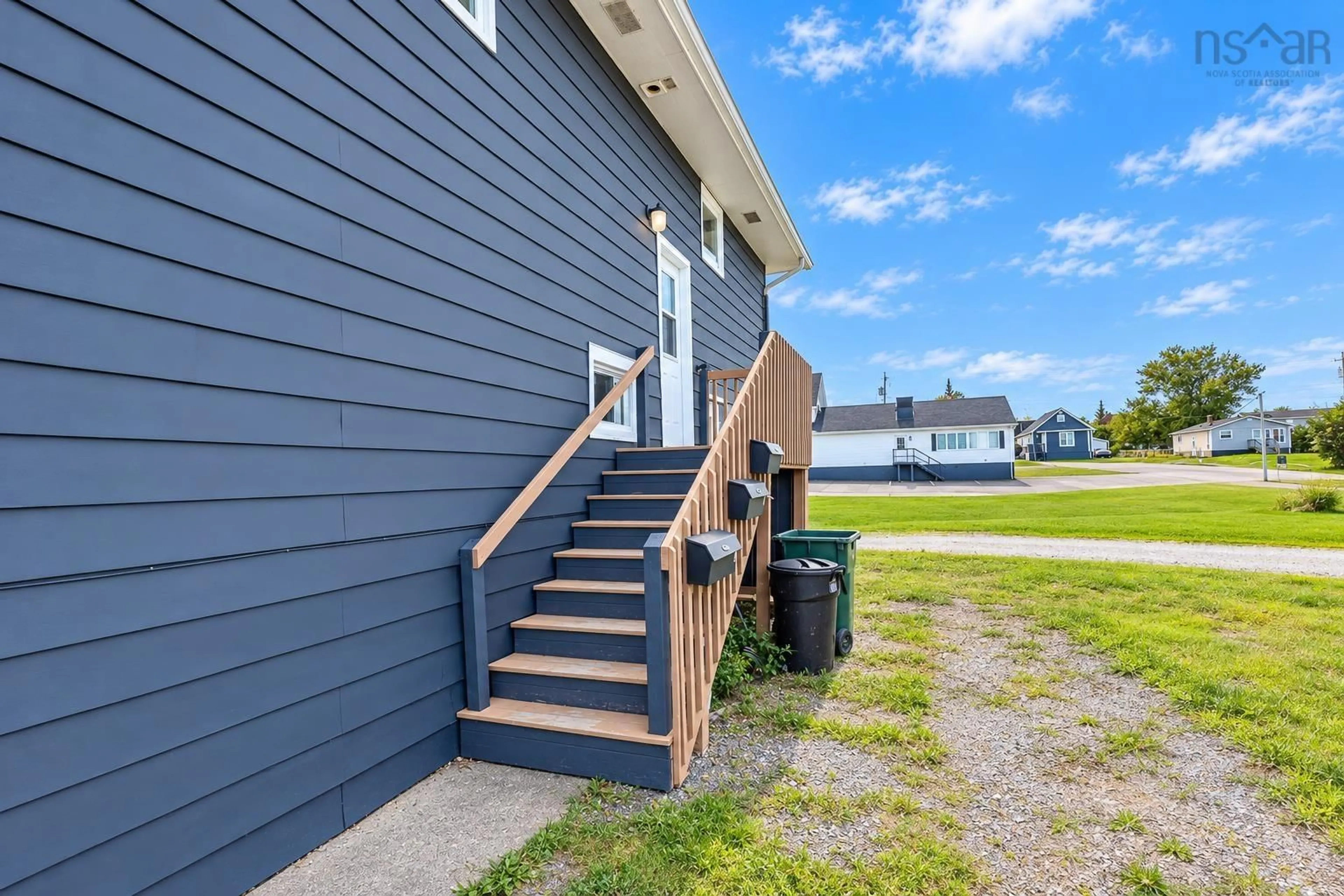 Home with vinyl exterior material, street for 379 Eighth St, New Waterford Nova Scotia B1H 3S6