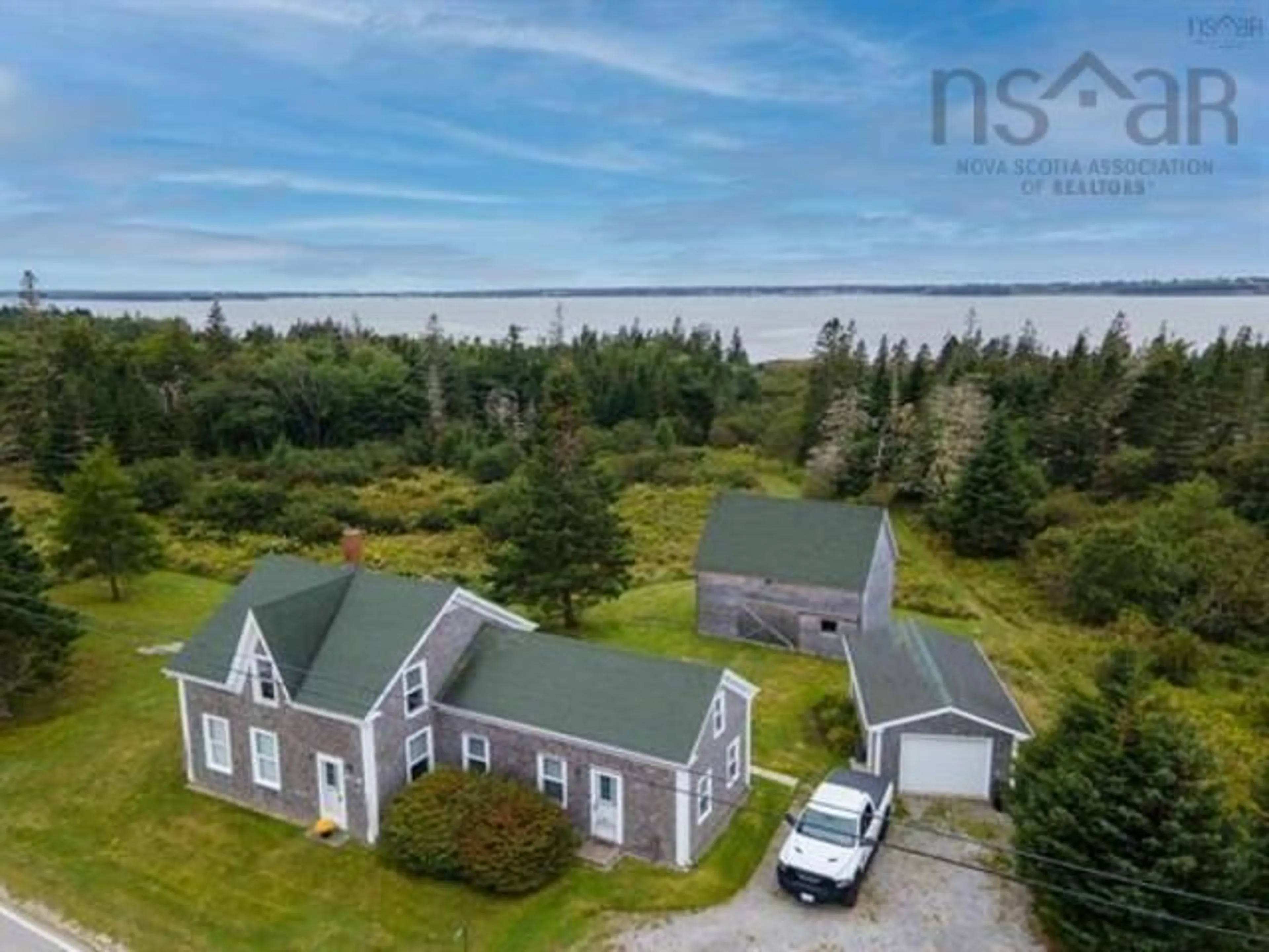 A pic from outside/outdoor area/front of a property/back of a property/a pic from drone, water/lake/river/ocean view for 1663 Highway 3, East Pubnico Nova Scotia B0W 2A0