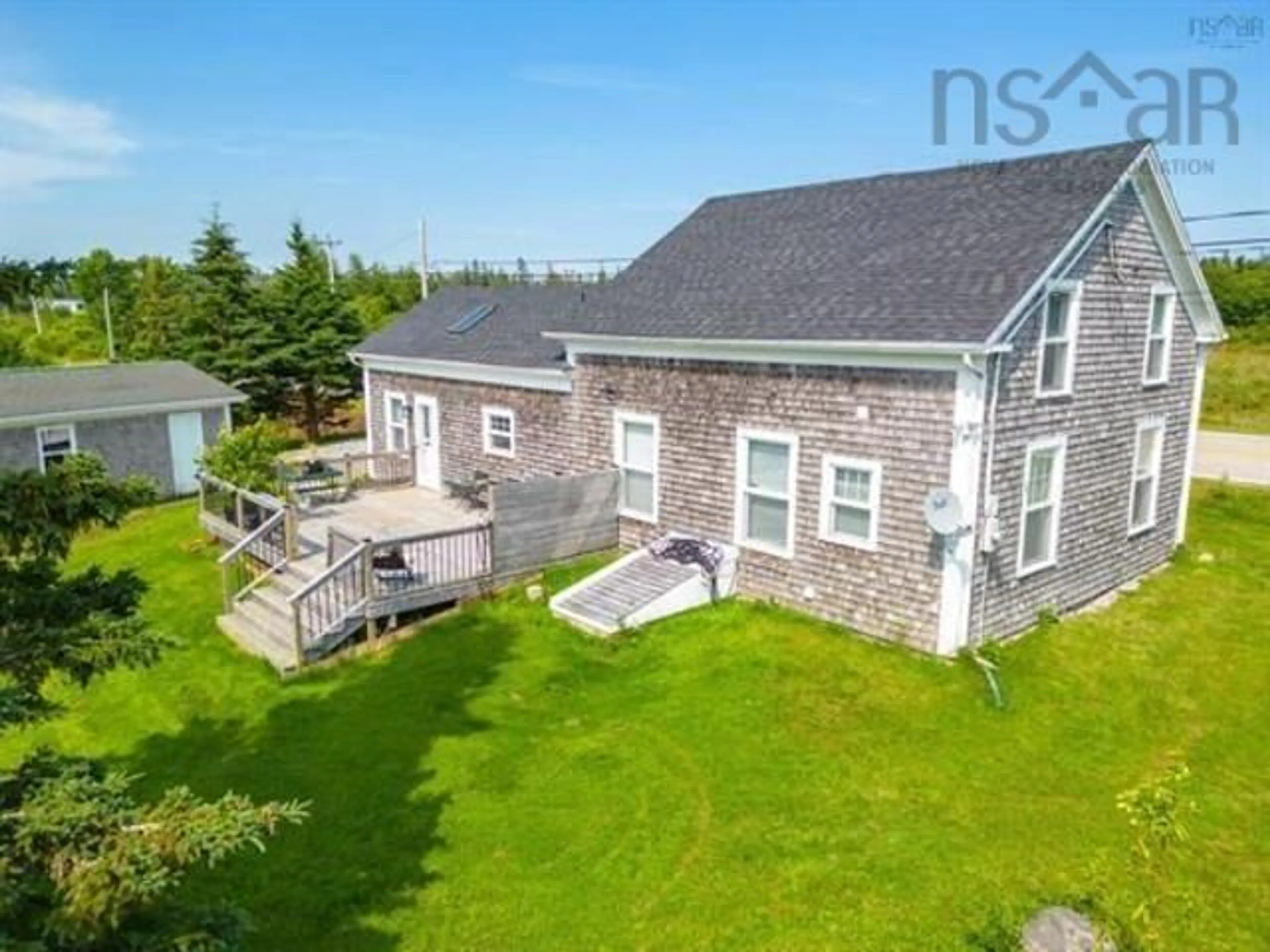 A pic from outside/outdoor area/front of a property/back of a property/a pic from drone, unknown for 1663 Highway 3, East Pubnico Nova Scotia B0W 2A0