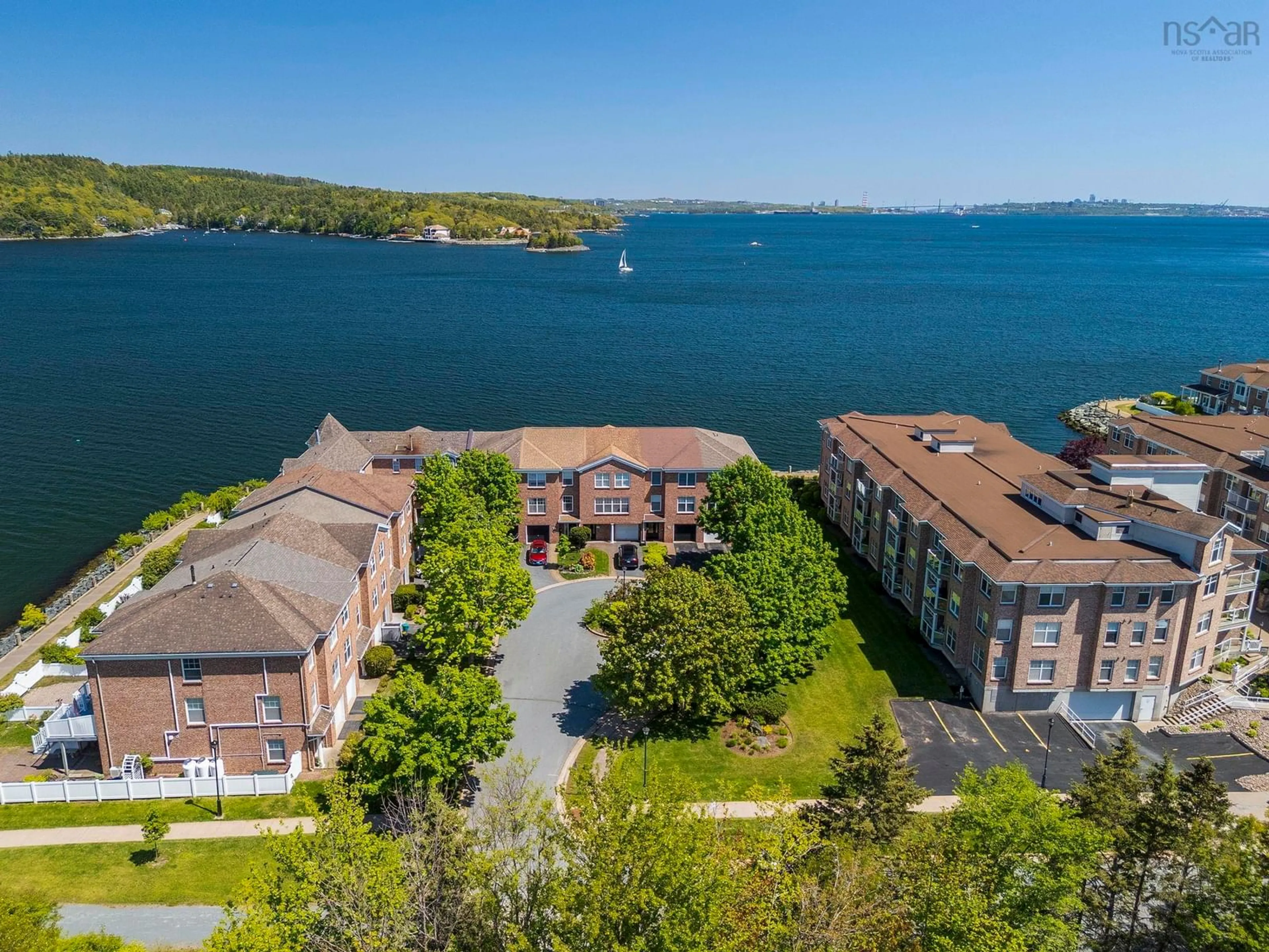 A pic from outside/outdoor area/front of a property/back of a property/a pic from drone, water/lake/river/ocean view for 5 Arthur Lismer Crt, Bedford Nova Scotia B4A 4B4