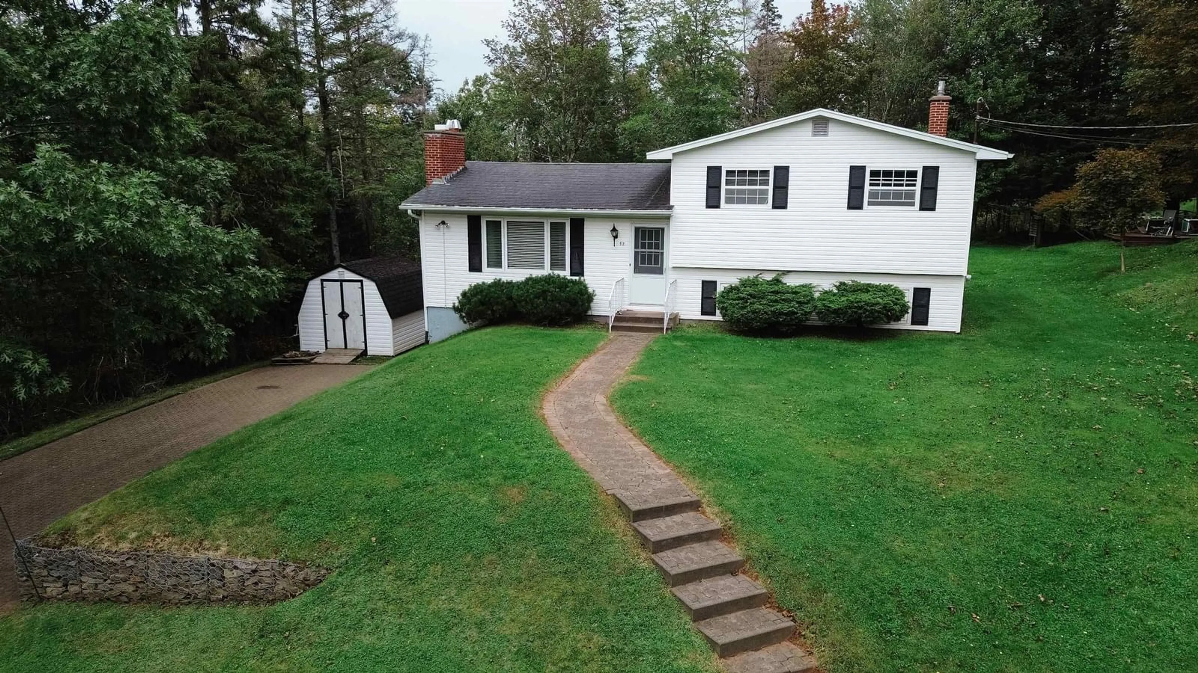 A pic from outside/outdoor area/front of a property/back of a property/a pic from drone, street for 52 Evergreen Dr, Salmon River Nova Scotia B2N 5J3