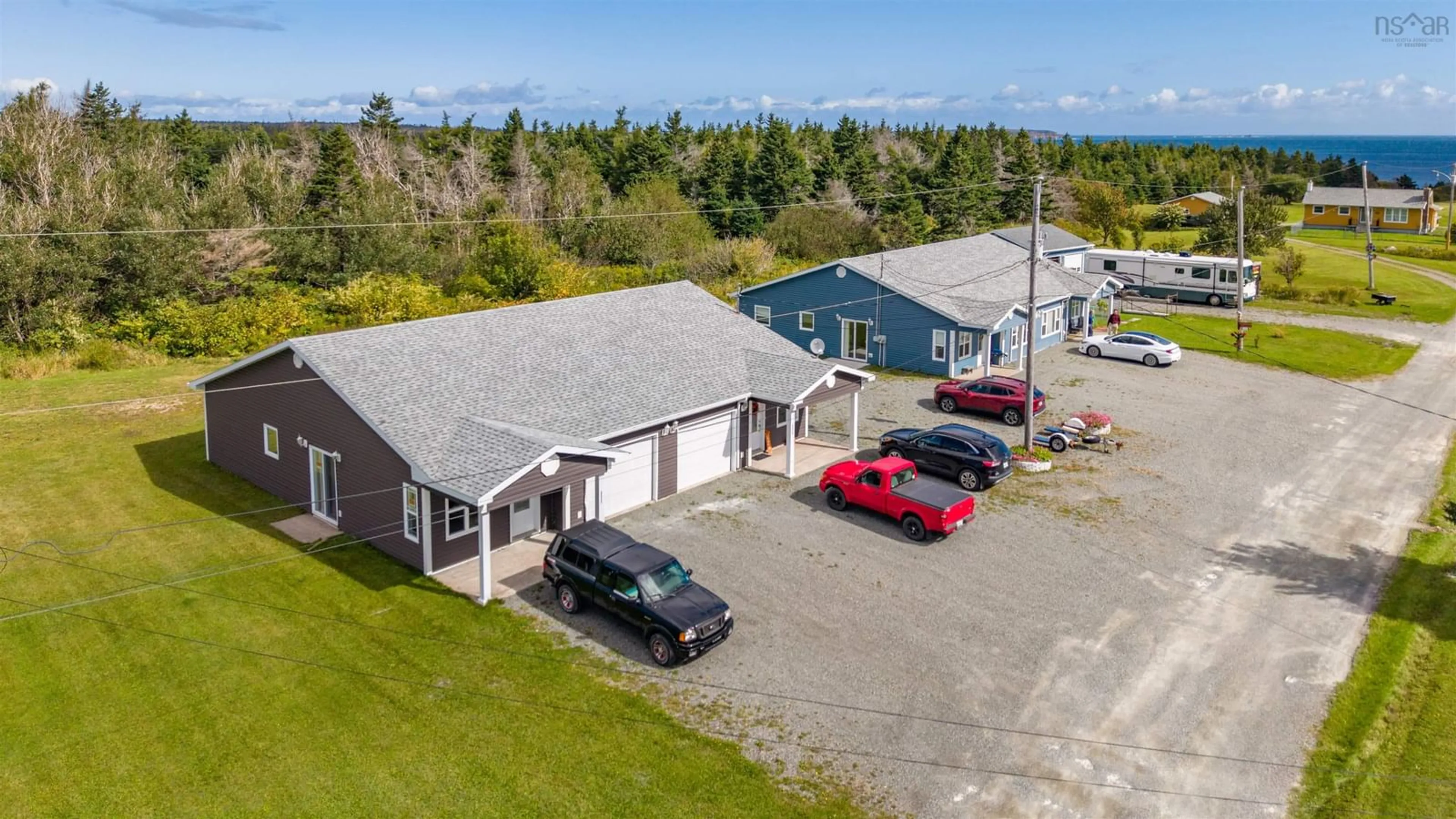 A pic from outside/outdoor area/front of a property/back of a property/a pic from drone, building for 2577 Morien Hwy Hwy, Port Morien Nova Scotia B1B 1C3