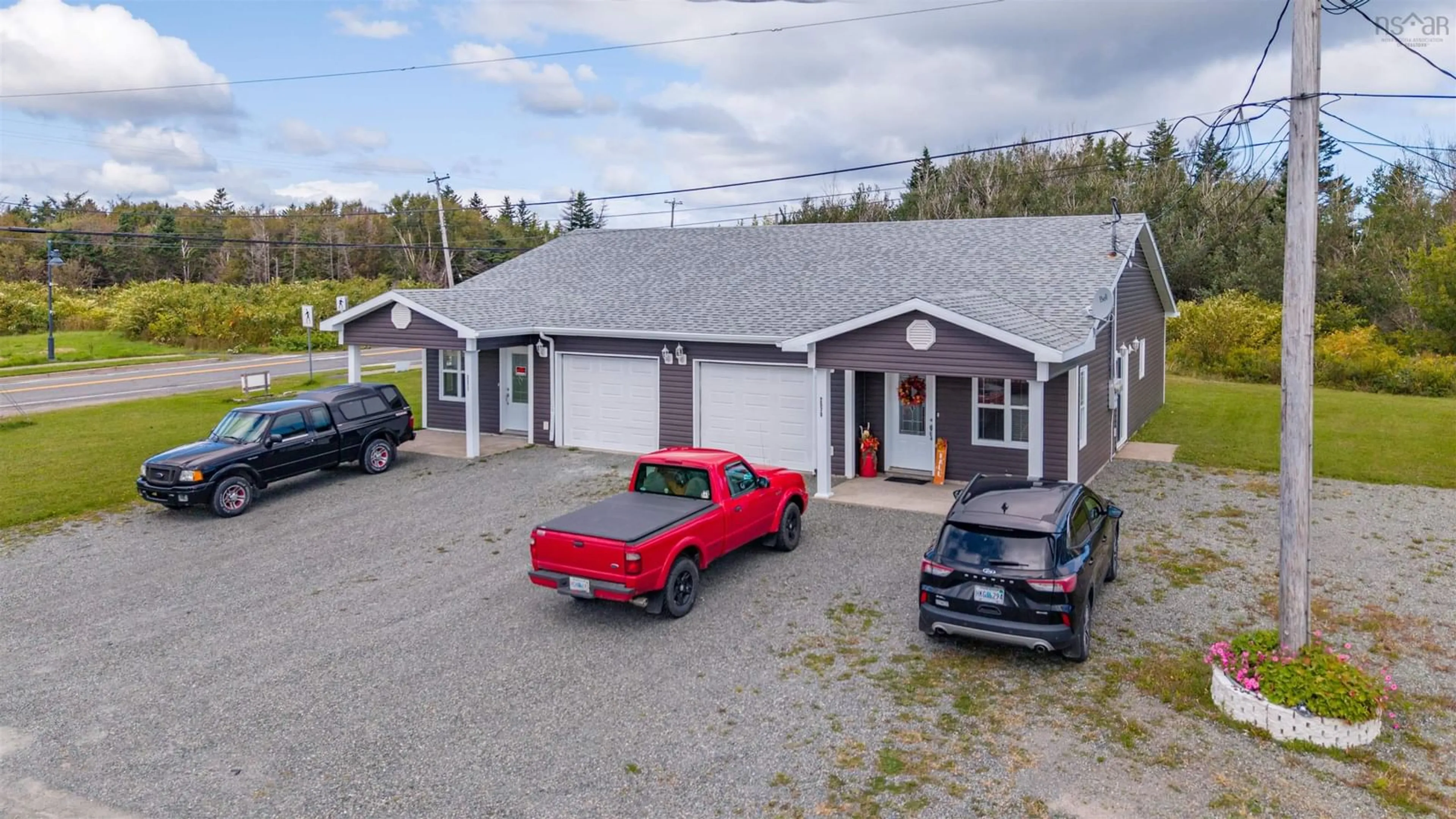 A pic from outside/outdoor area/front of a property/back of a property/a pic from drone, building for 2577 Morien Hwy Hwy, Port Morien Nova Scotia B1B 1C3