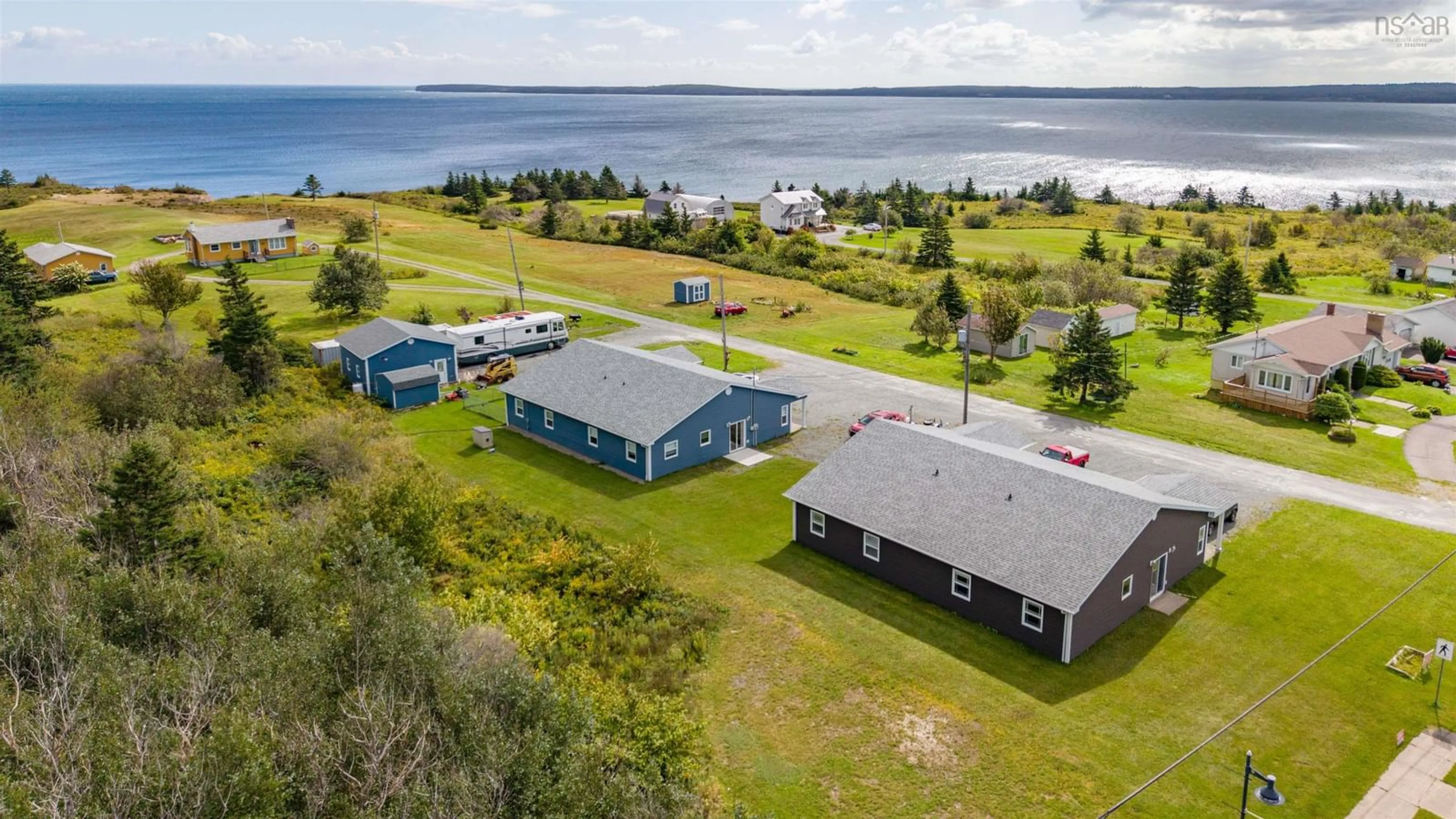 A pic from outside/outdoor area/front of a property/back of a property/a pic from drone, water/lake/river/ocean view for 2577 Morien Hwy Hwy, Port Morien Nova Scotia B1B 1C3