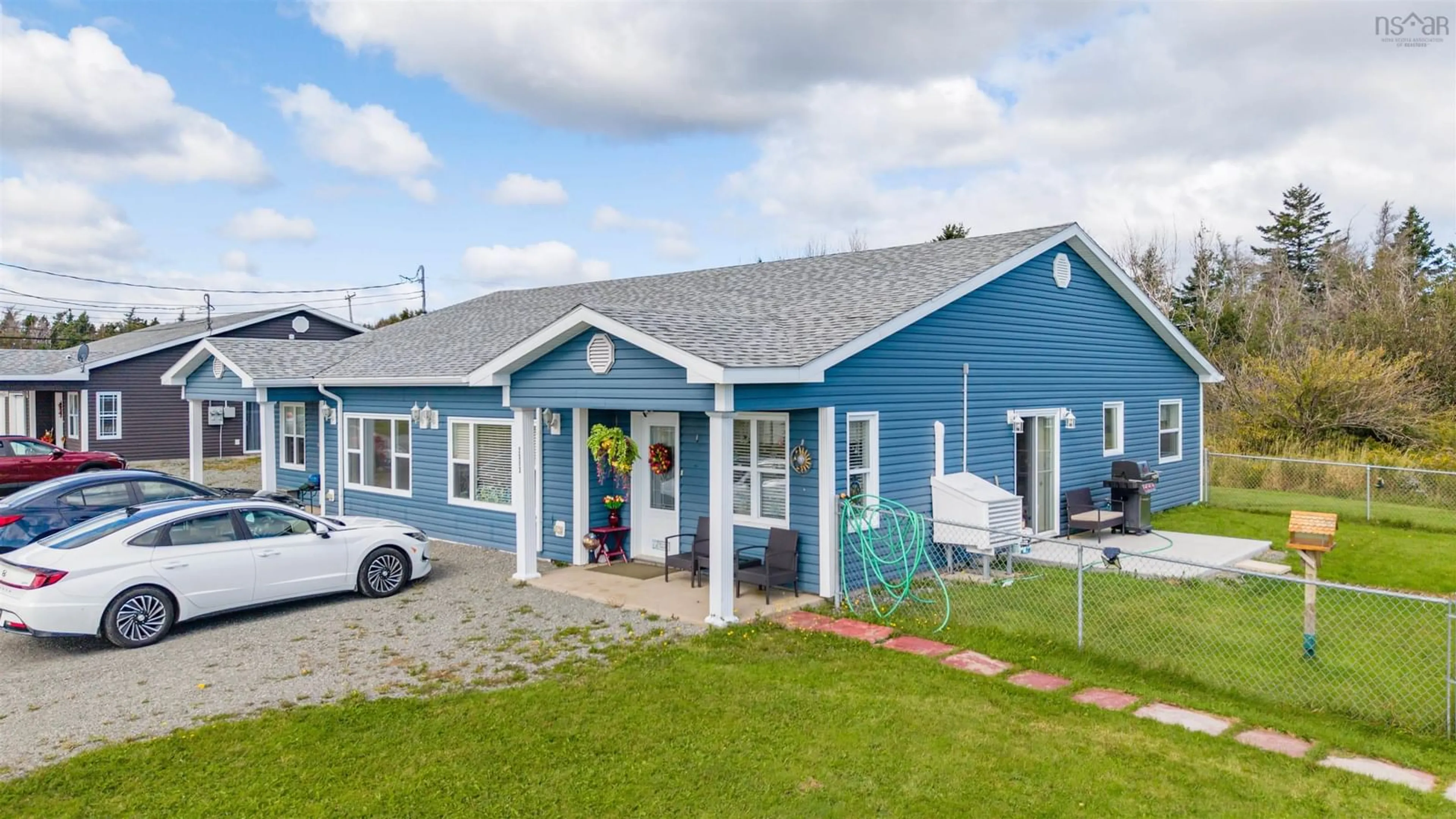 Home with vinyl exterior material, street for 2581 Morien Hwy Hwy, Port Morien Nova Scotia B1B 1C3