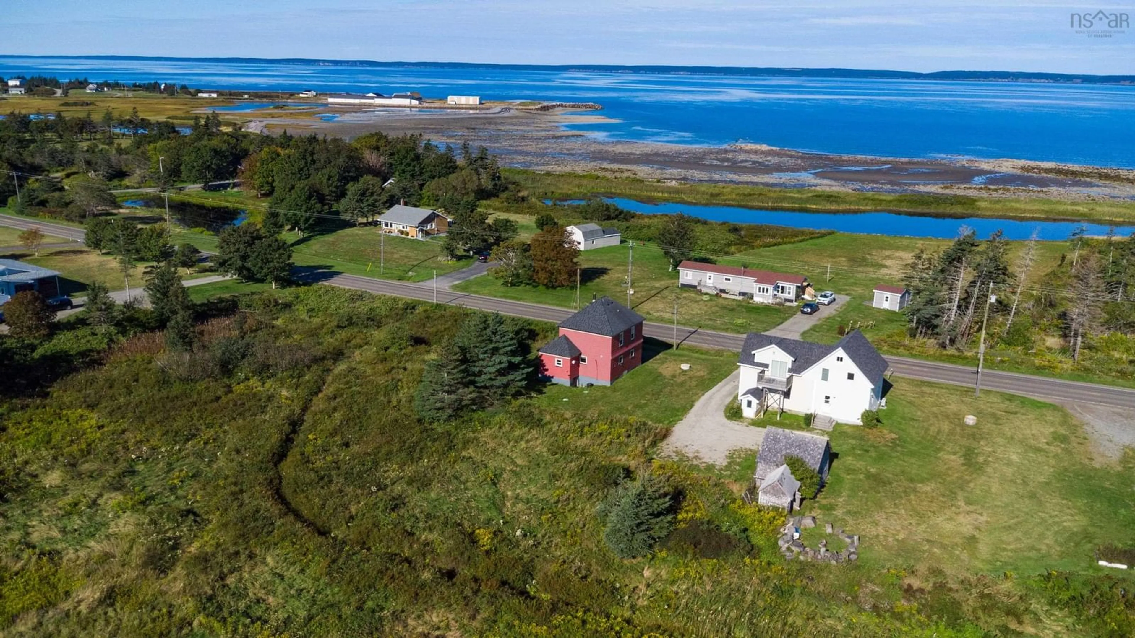 A pic from outside/outdoor area/front of a property/back of a property/a pic from drone, water/lake/river/ocean view for 2008 Highway 1, Church Point Nova Scotia B0W 1M0
