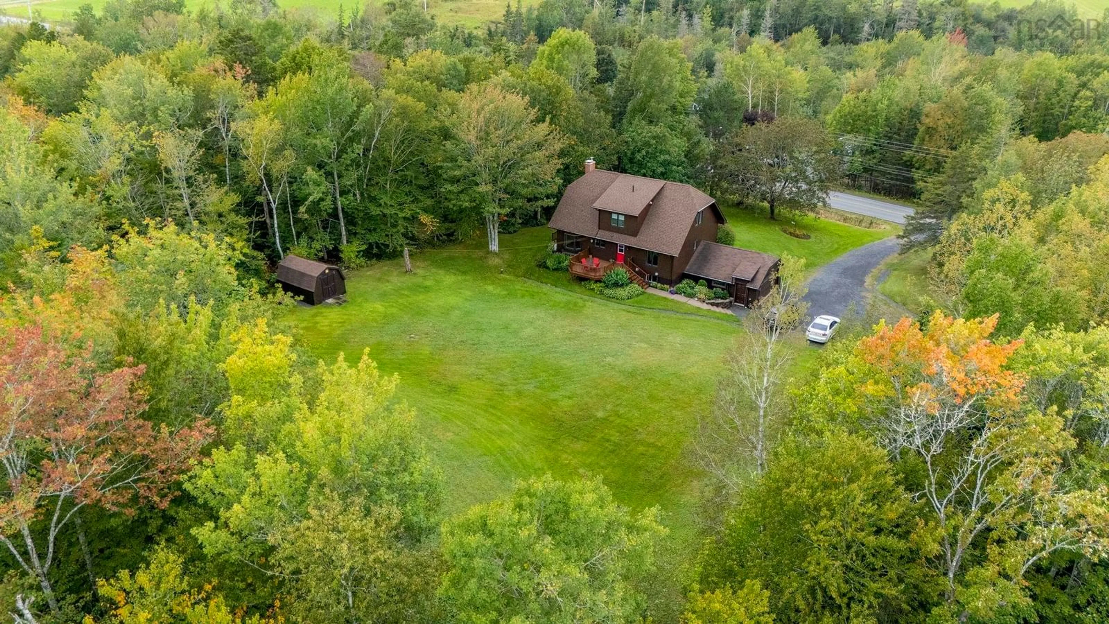 A pic from outside/outdoor area/front of a property/back of a property/a pic from drone, forest/trees view for 3764 East River East Side Rd, Churchville Nova Scotia B2H 5C5
