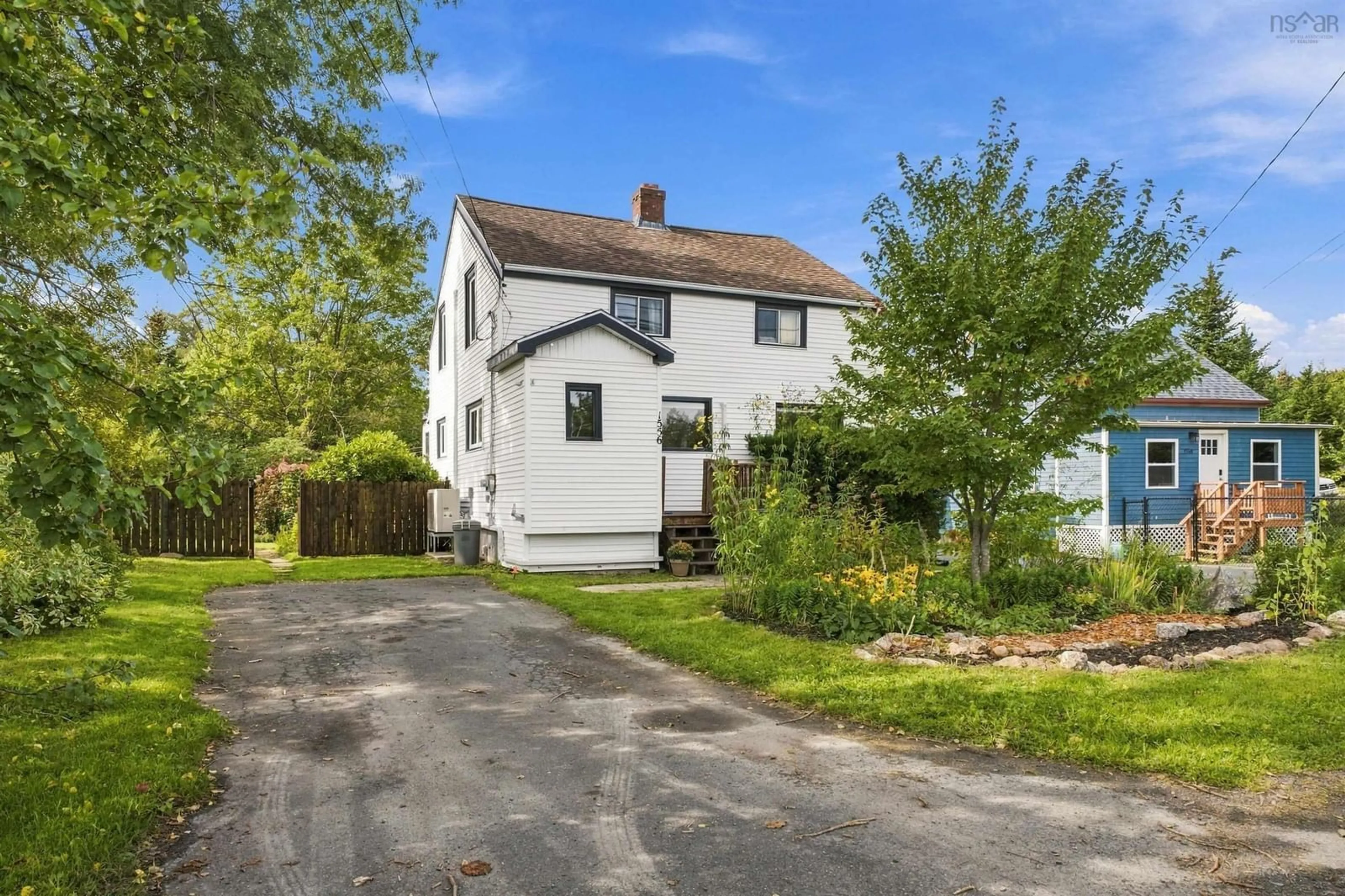 A pic from outside/outdoor area/front of a property/back of a property/a pic from drone, street for 1556 St Margarets Bay Rd, Lakeside Nova Scotia B3T 1A9