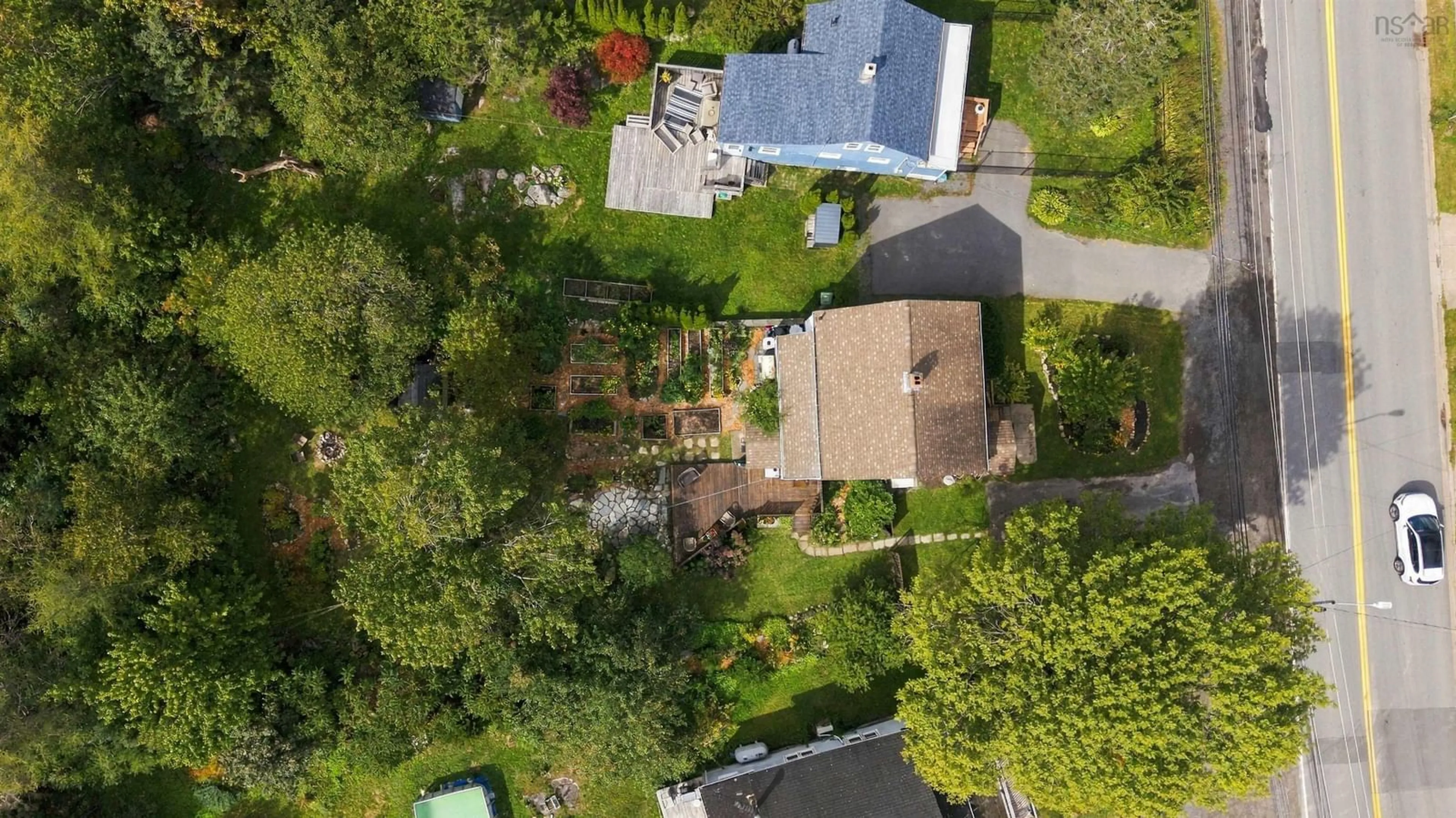 A pic from outside/outdoor area/front of a property/back of a property/a pic from drone, street for 1556 St Margarets Bay Rd, Lakeside Nova Scotia B3T 1A9
