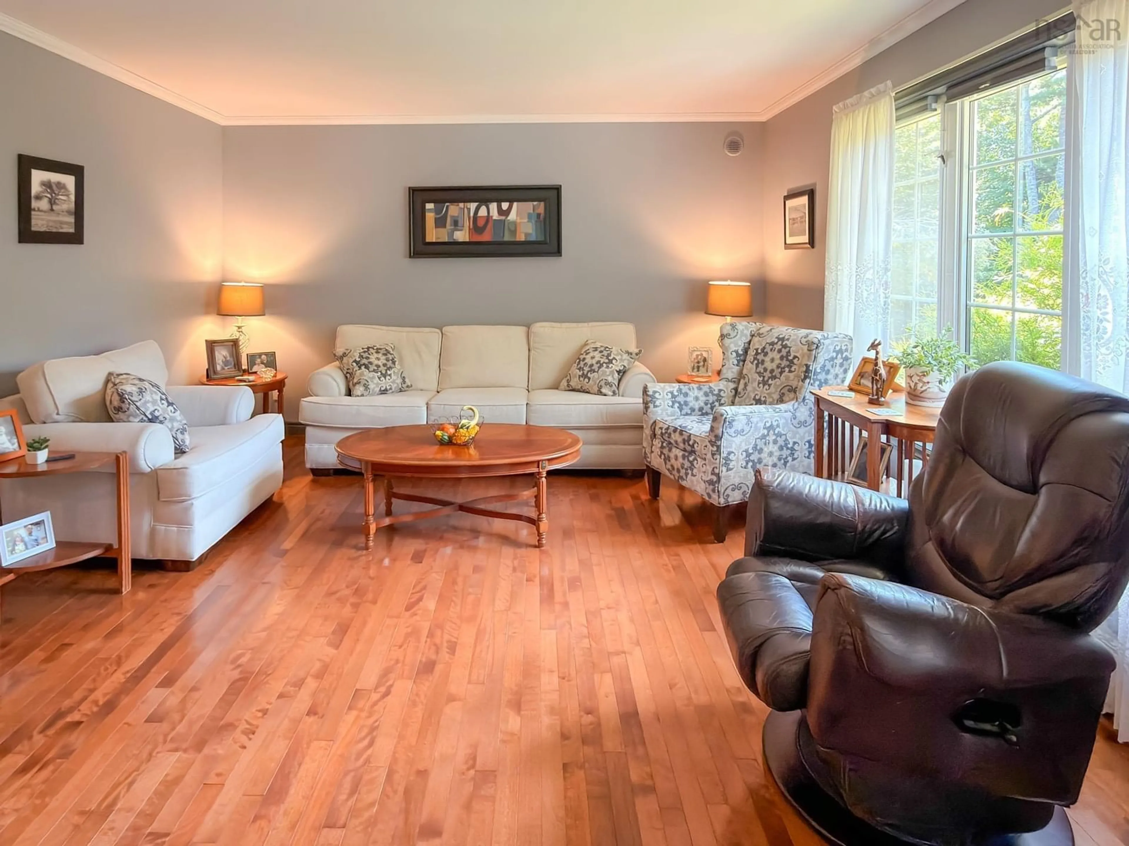 Living room with furniture, wood/laminate floor for 120 Dawson Hts, Pine Grove Nova Scotia B0J 1E0