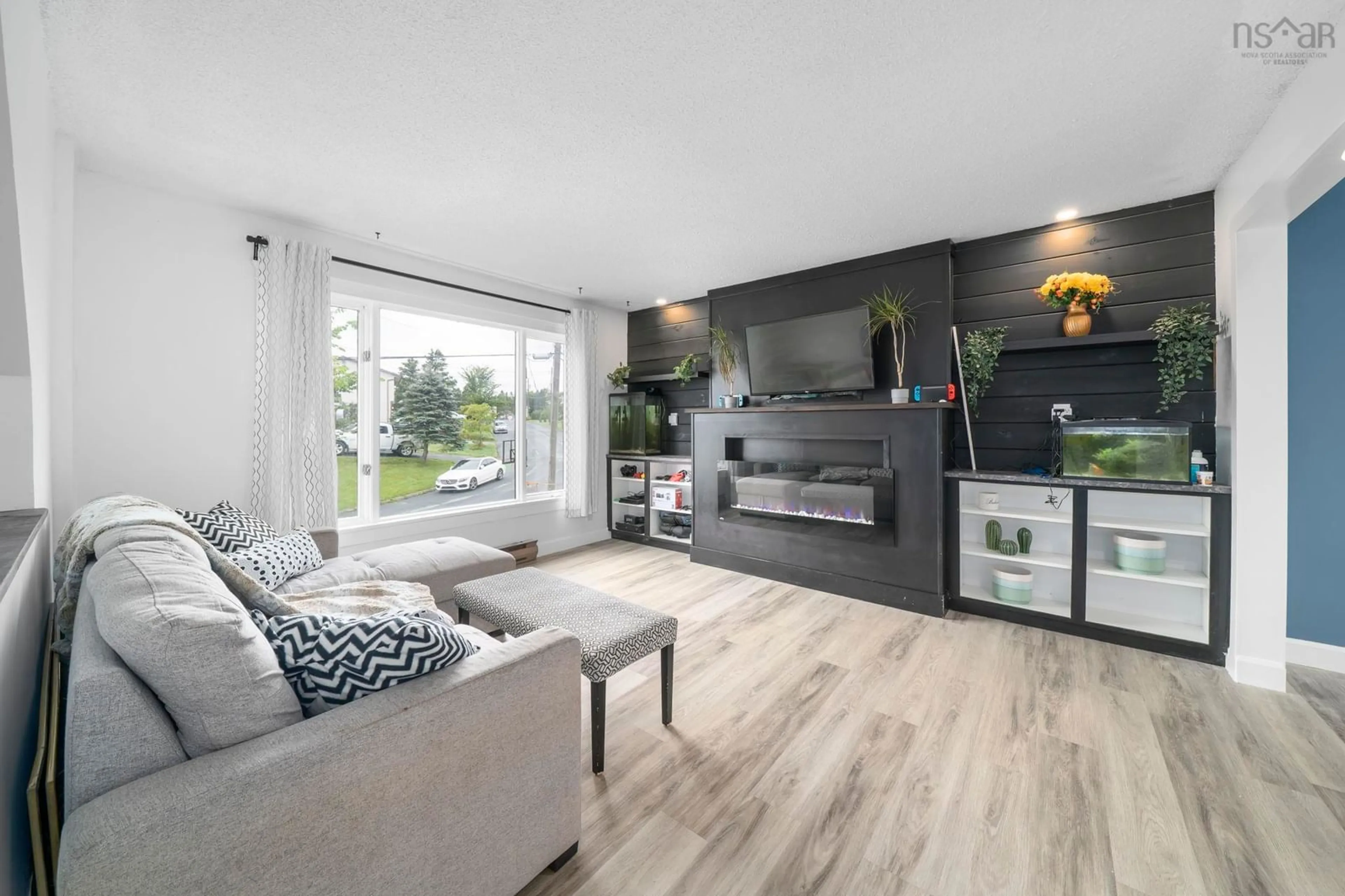 Living room with furniture, wood/laminate floor for 114 Romkey Drive, Eastern Passage Nova Scotia B3G 1H2