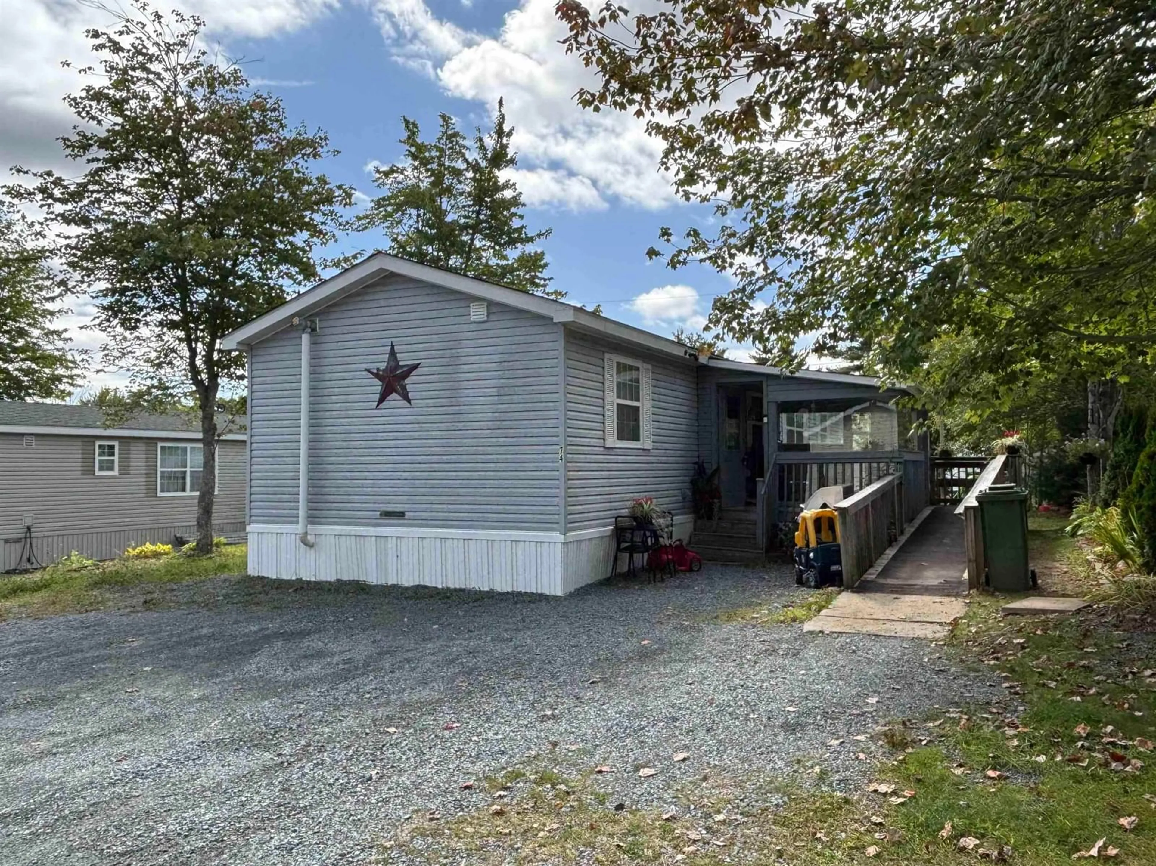 Home with vinyl exterior material, street for 74 Veinotte Dr, Wileville Nova Scotia B4V 5K2