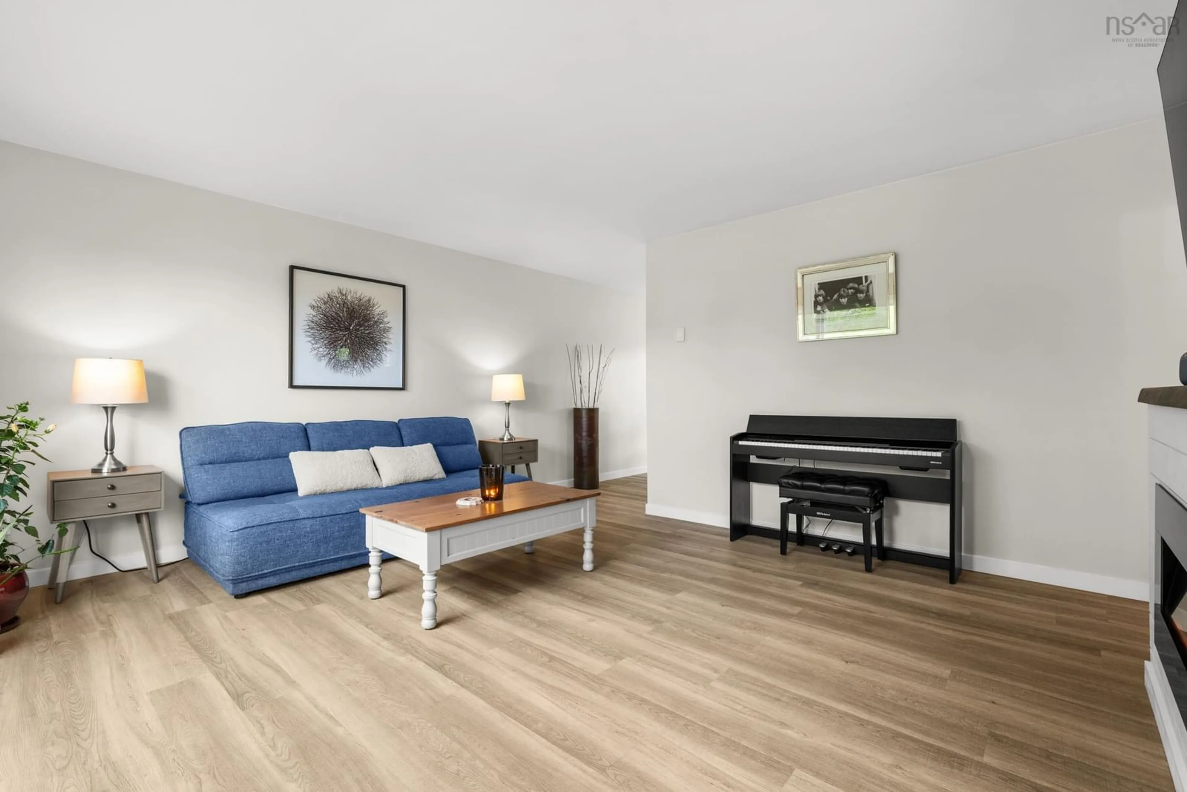Living room with furniture, wood/laminate floor for 20 Stratford Dr, Cole Harbour Nova Scotia B2V 2M6