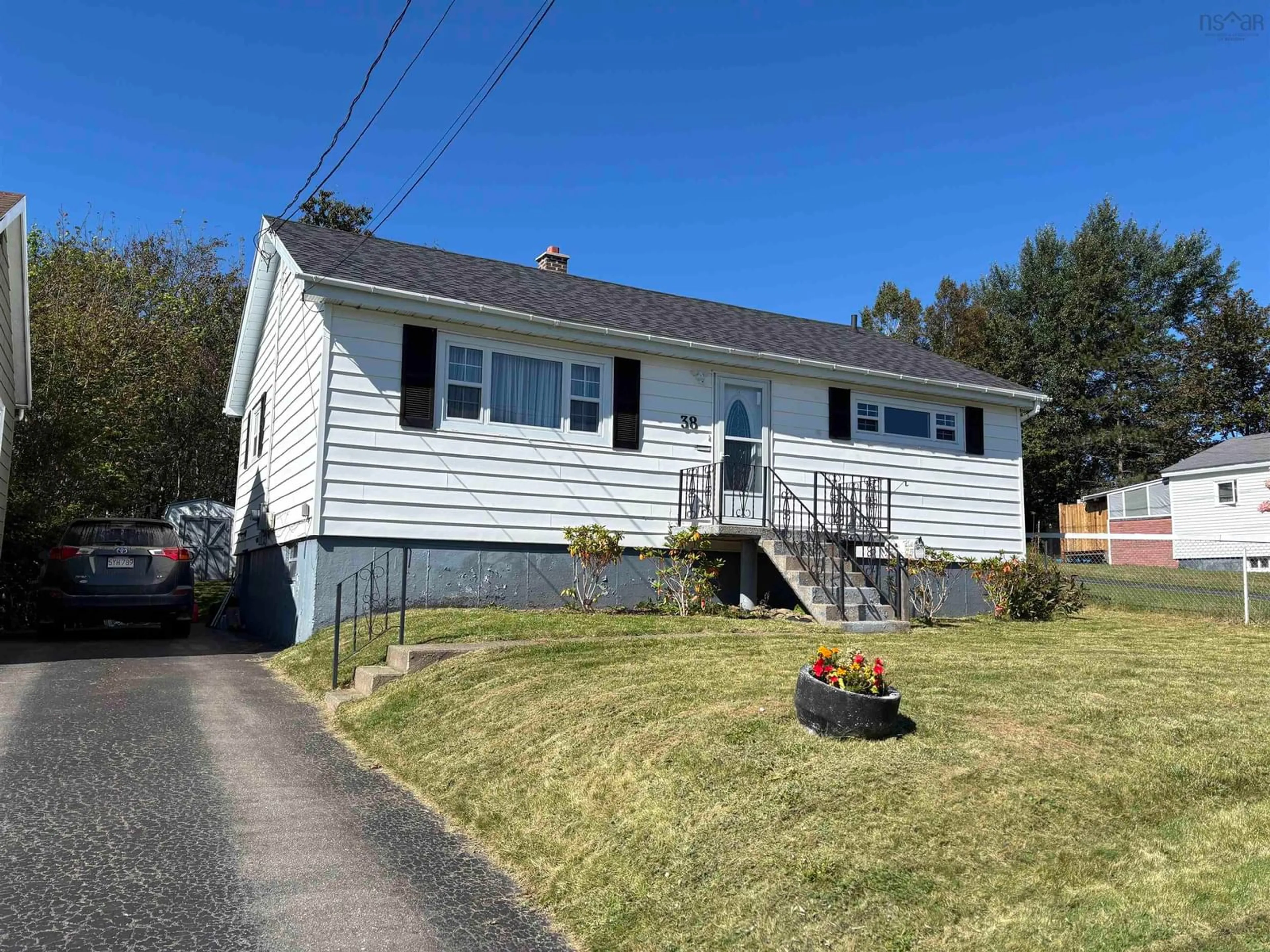 Home with vinyl exterior material, street for 38 Young Avenue, North Sydney Nova Scotia B2A 1Y6