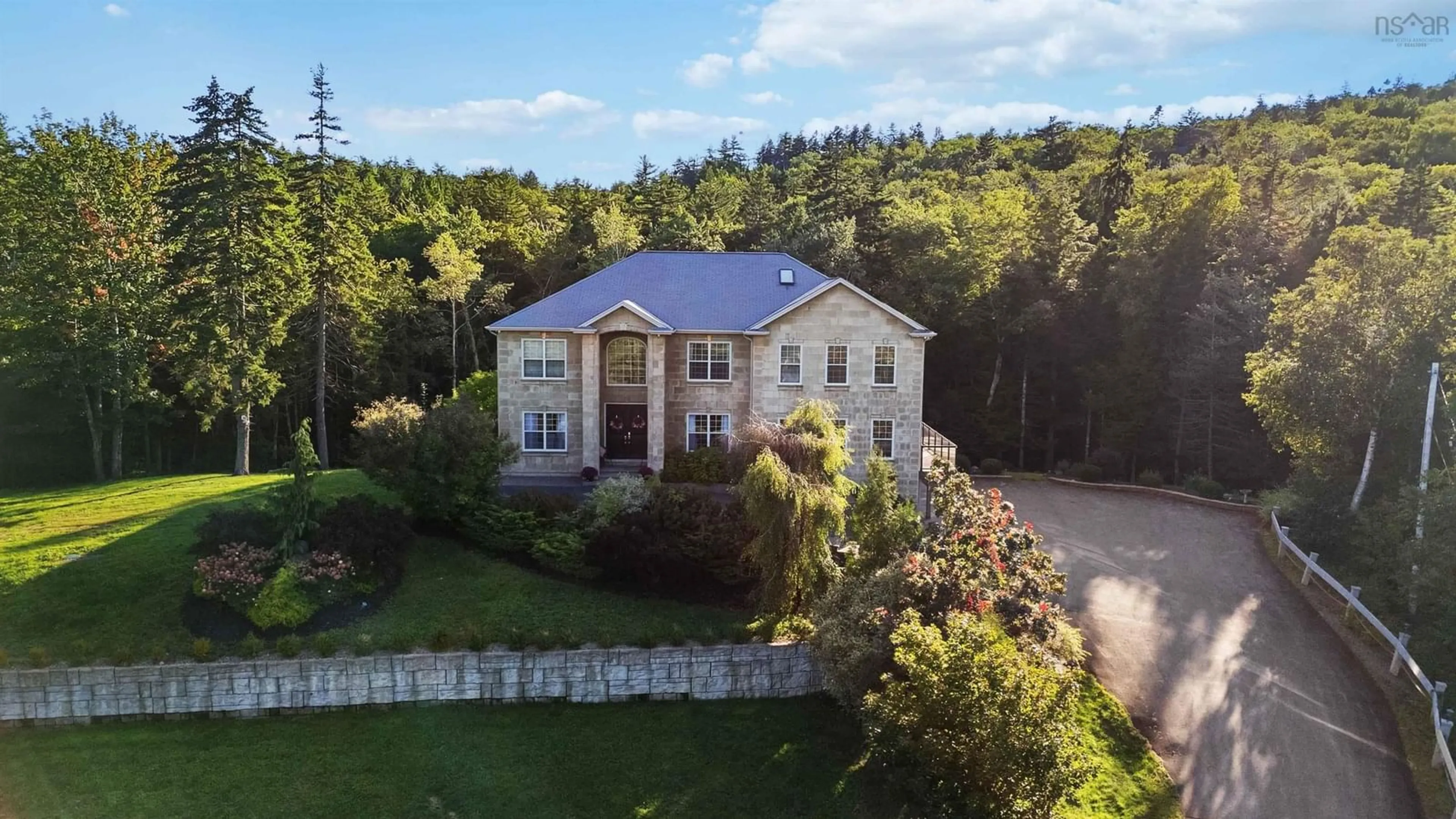 A pic from outside/outdoor area/front of a property/back of a property/a pic from drone, unknown for 61 Colins Rd, Hammonds Plains Nova Scotia B4B 1S8