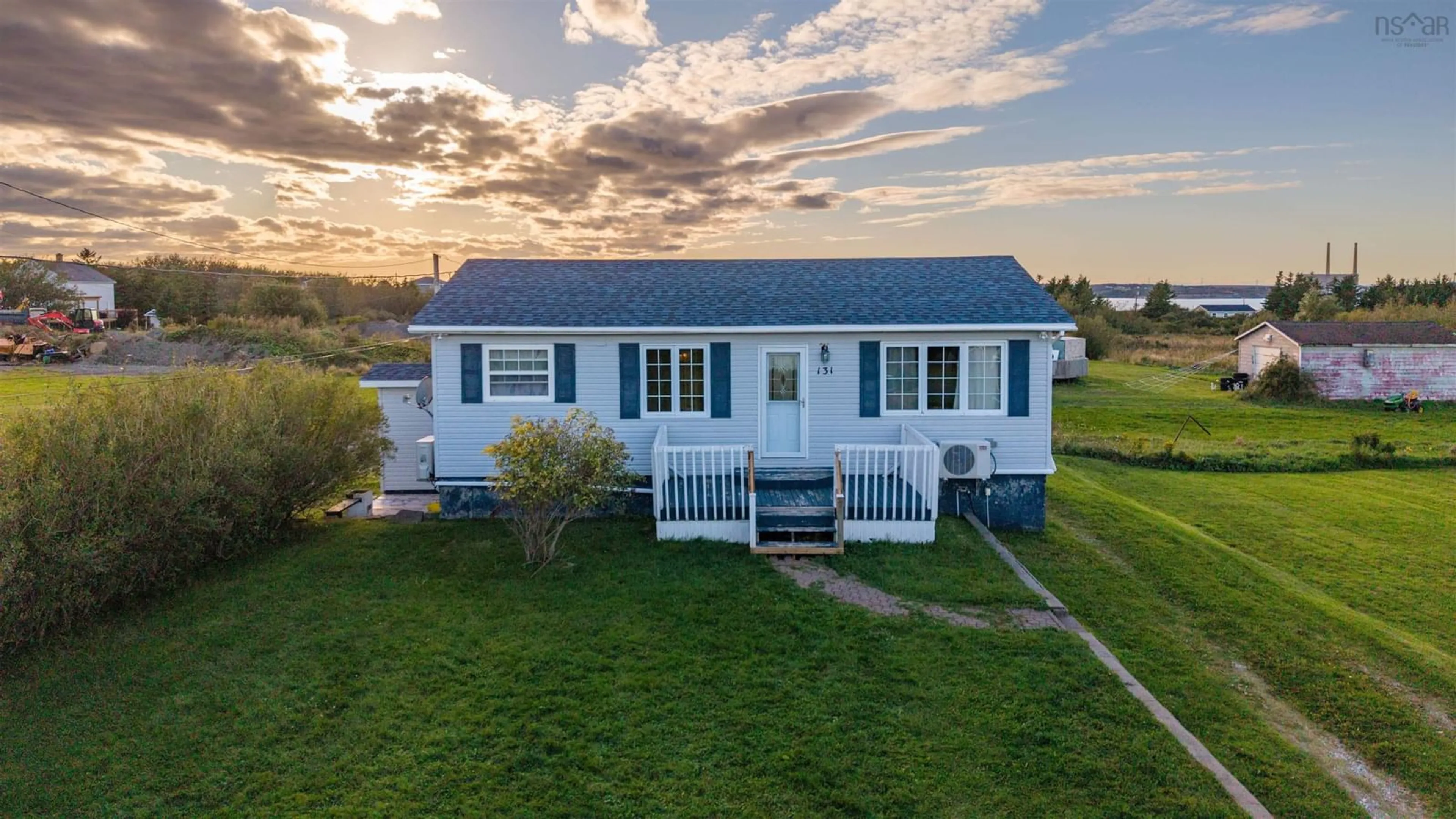 A pic from outside/outdoor area/front of a property/back of a property/a pic from drone, unknown for 131 Ocean Ave, Dominion Nova Scotia B1G 1R4