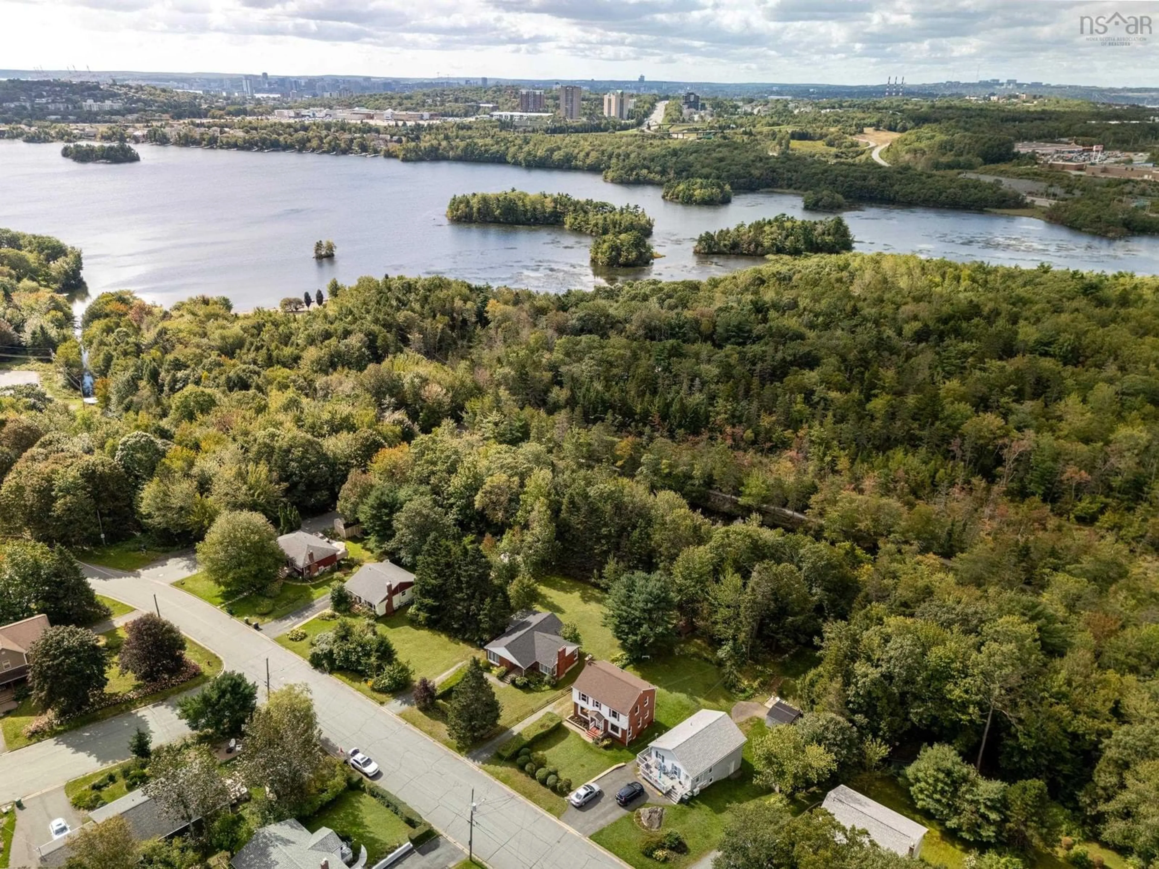 A pic from outside/outdoor area/front of a property/back of a property/a pic from drone, water/lake/river/ocean view for 44 Locks Rd, Dartmouth Nova Scotia B2X 2J5