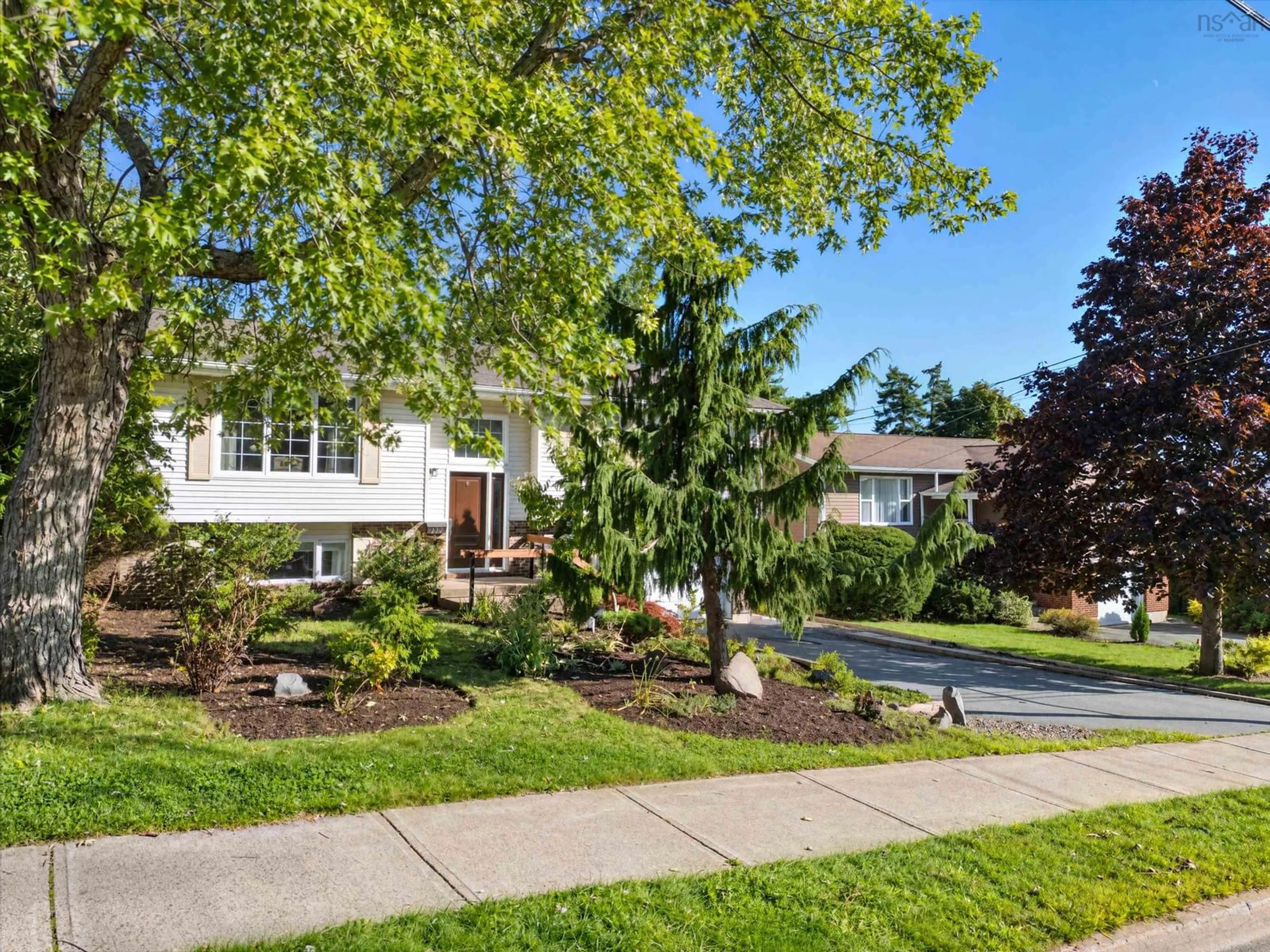 Home with vinyl exterior material, street for 117 Basinview Dr, Bedford Nova Scotia B4A 3M9