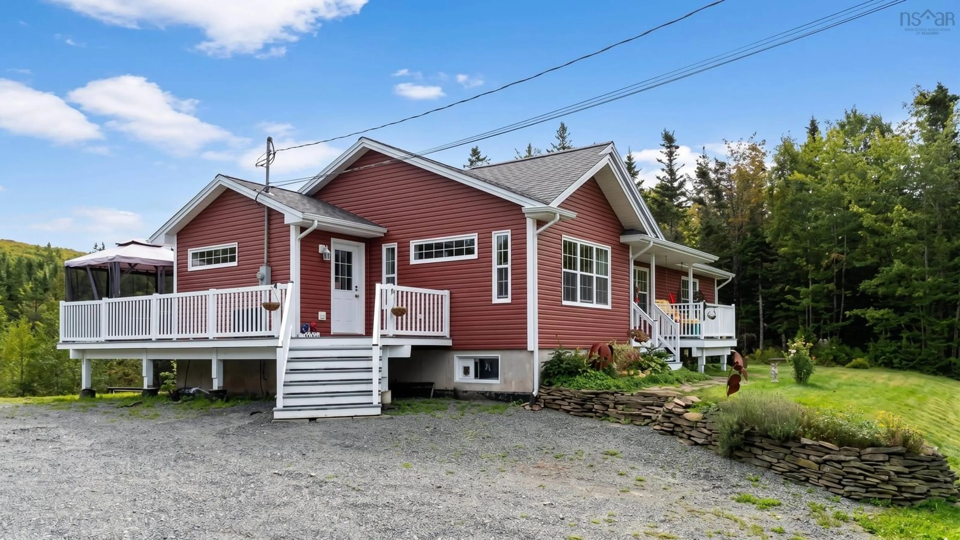 Home with vinyl exterior material, street for 3975 East Bay Hwy, East Bay Nova Scotia B1J 1M4