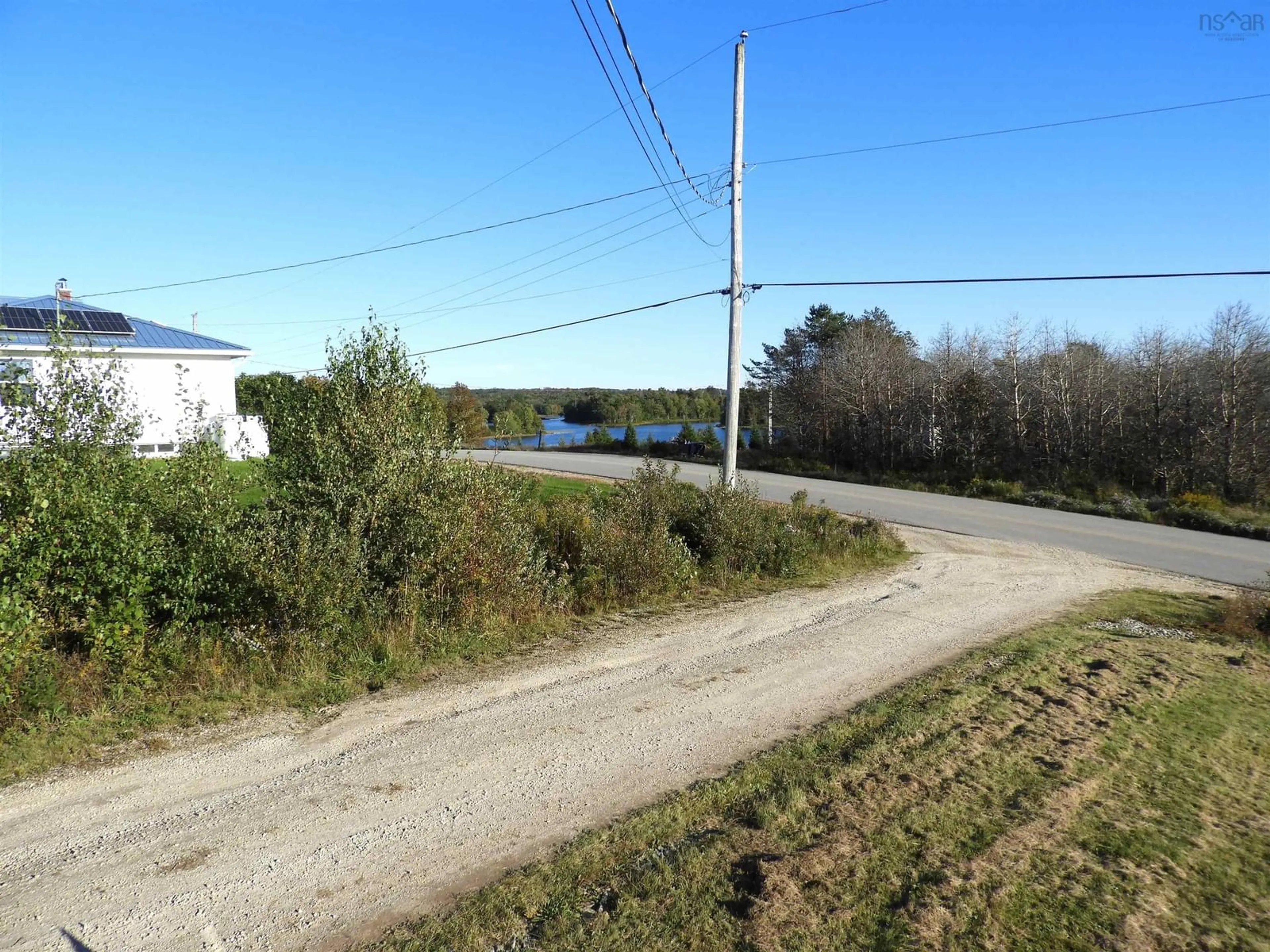 A pic from outside/outdoor area/front of a property/back of a property/a pic from drone, water/lake/river/ocean view for 610 Lake Ramsay Rd, Lake Ramsay Nova Scotia B0J 2M0