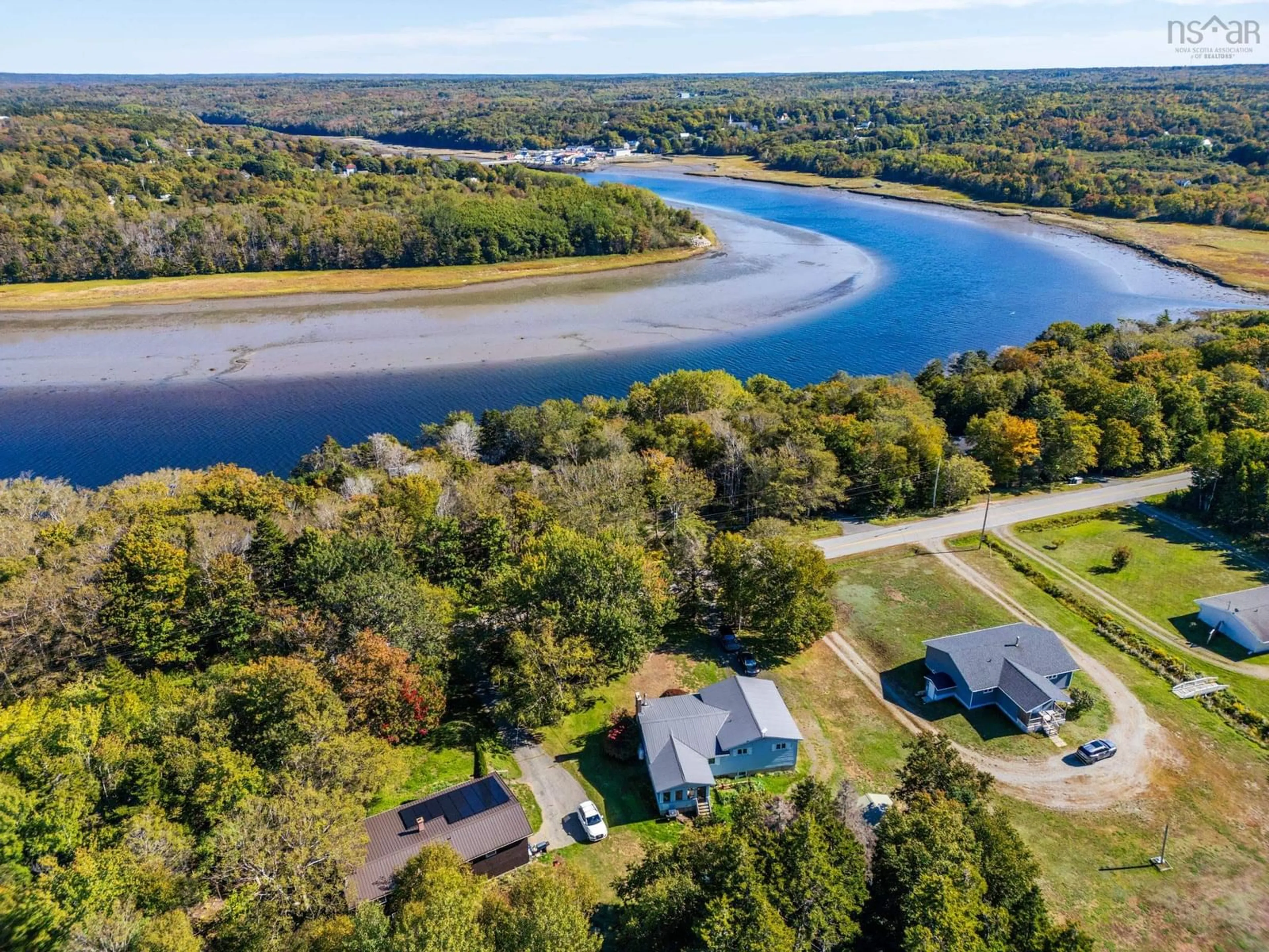 A pic from outside/outdoor area/front of a property/back of a property/a pic from drone, water/lake/river/ocean view for 1530 Riverside Road, New Edinburgh Nova Scotia B0W 3T0