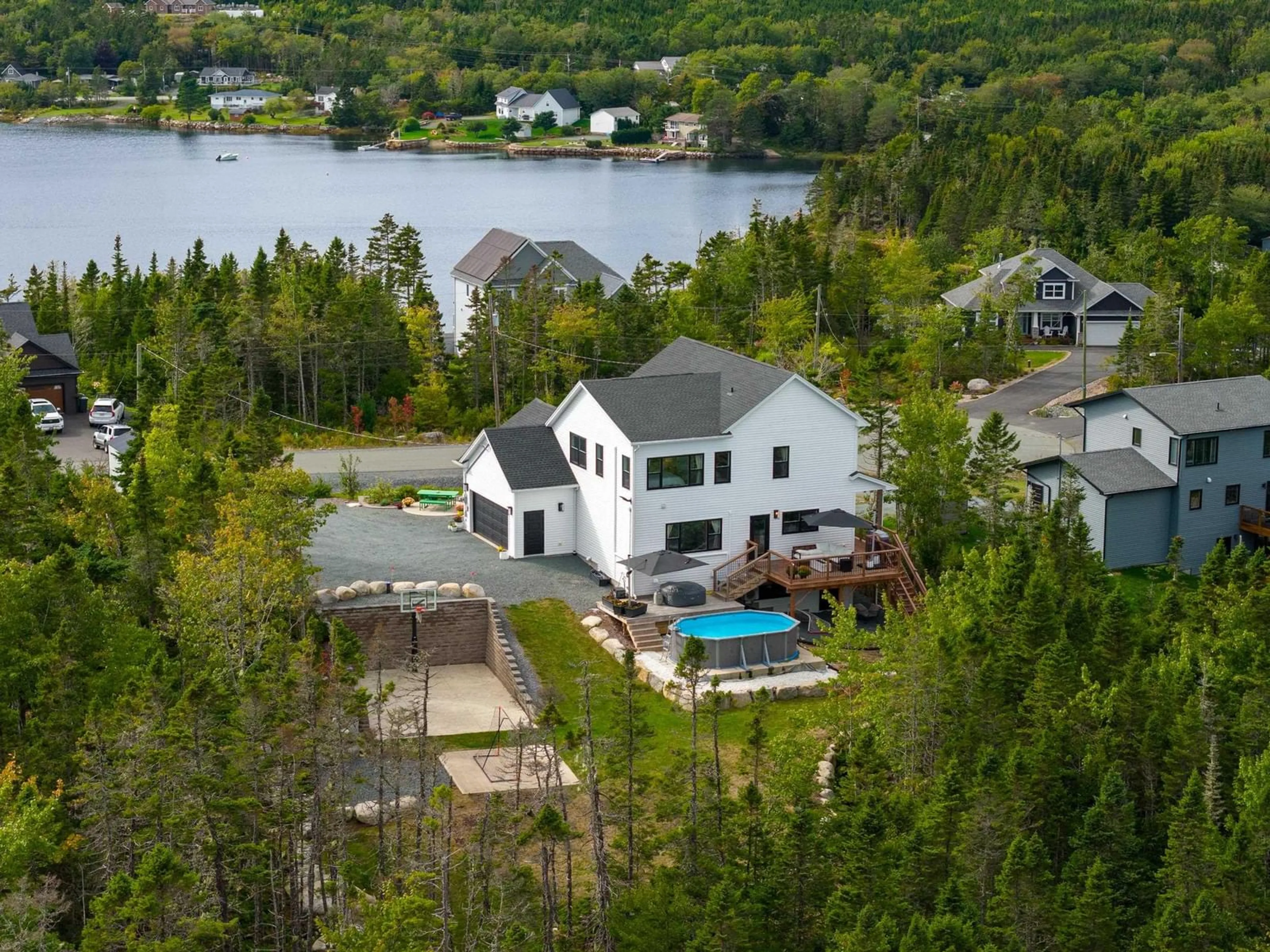 A pic from outside/outdoor area/front of a property/back of a property/a pic from drone, water/lake/river/ocean view for 141 Hargrove Lane, Whites Lake Nova Scotia B3T 0H8