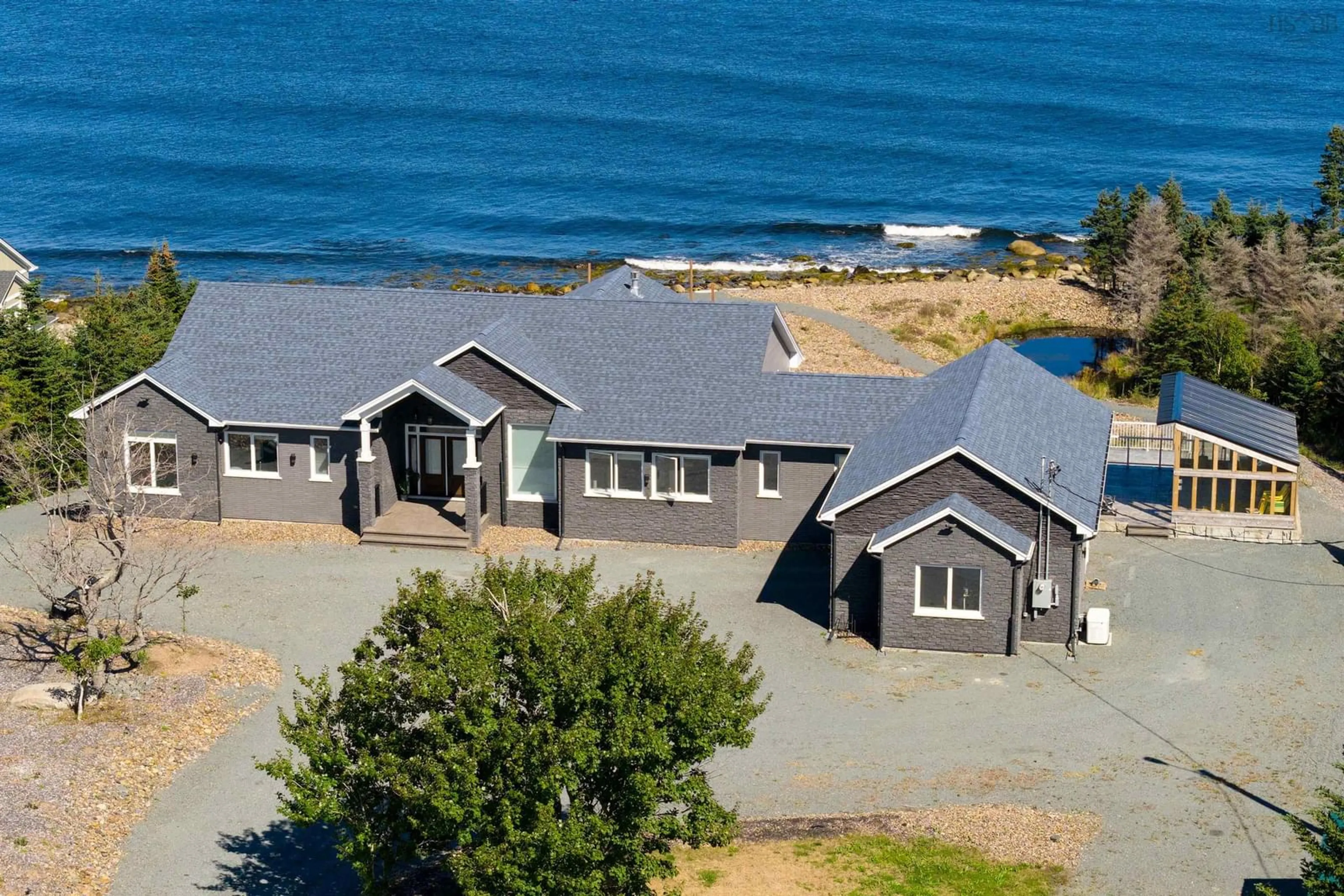 A pic from outside/outdoor area/front of a property/back of a property/a pic from drone, water/lake/river/ocean view for 458 Ketch Harbour Rd, Bear Cove Nova Scotia B3V 1P8