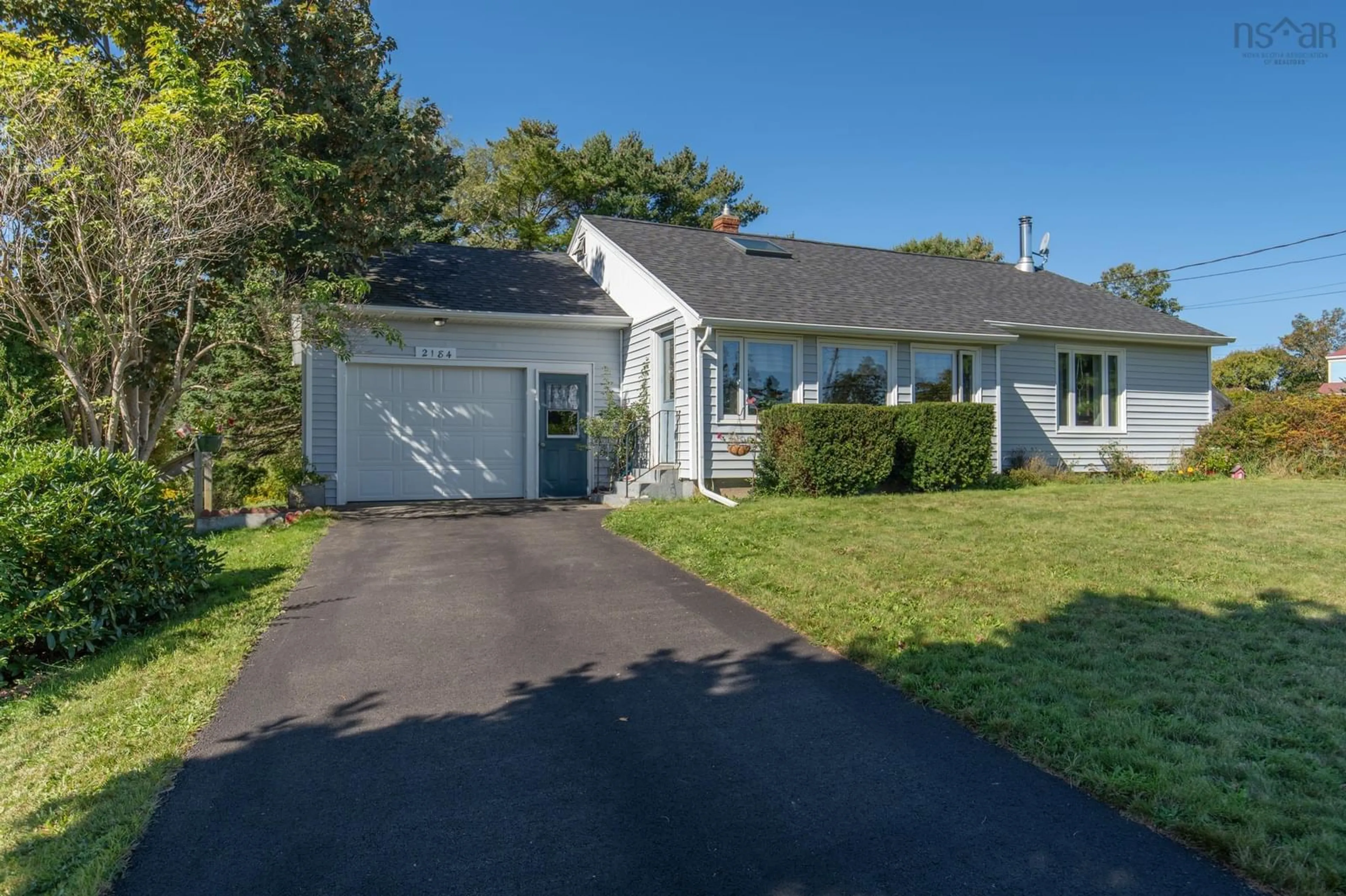 Home with vinyl exterior material, street for 2184 Highway 334, Upper Wedgeport Nova Scotia B0W 1B0