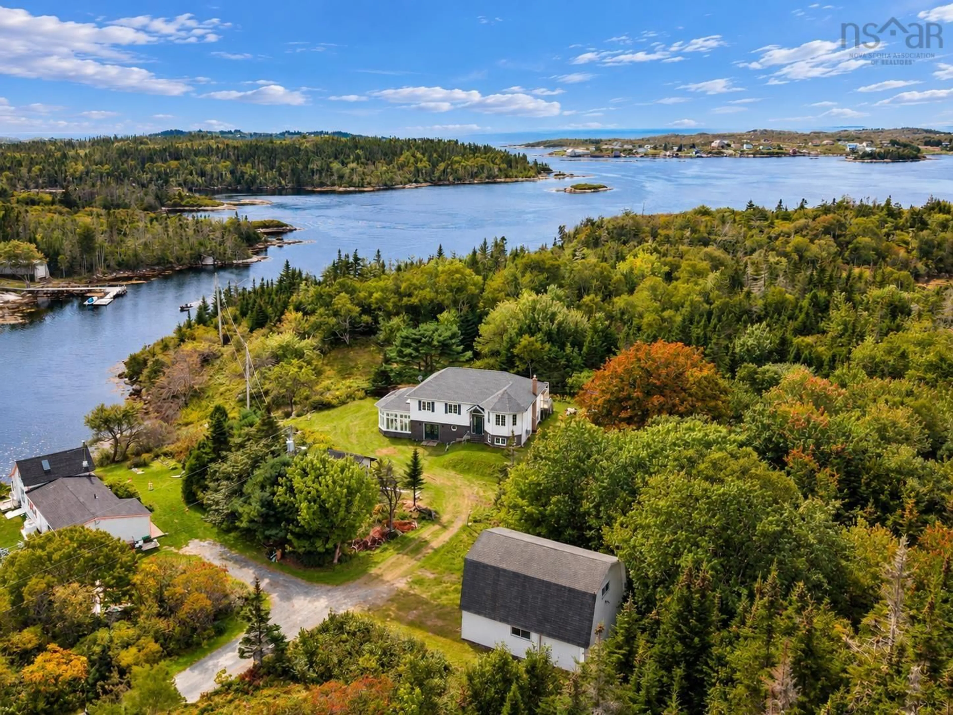 A pic from outside/outdoor area/front of a property/back of a property/a pic from drone, water/lake/river/ocean view for 257 East Dover Rd, East Dover Nova Scotia B3Z 3W4