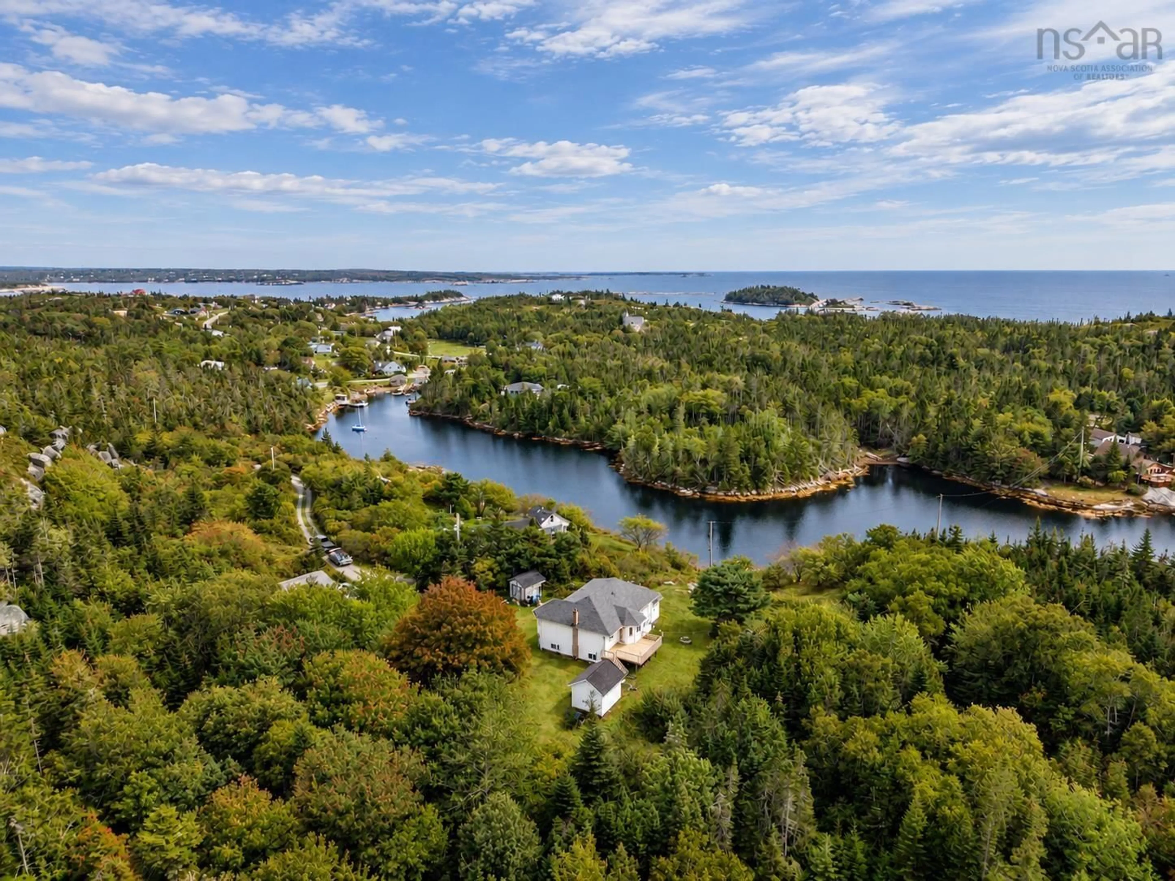 A pic from outside/outdoor area/front of a property/back of a property/a pic from drone, water/lake/river/ocean view for 257 East Dover Rd, East Dover Nova Scotia B3Z 3W4