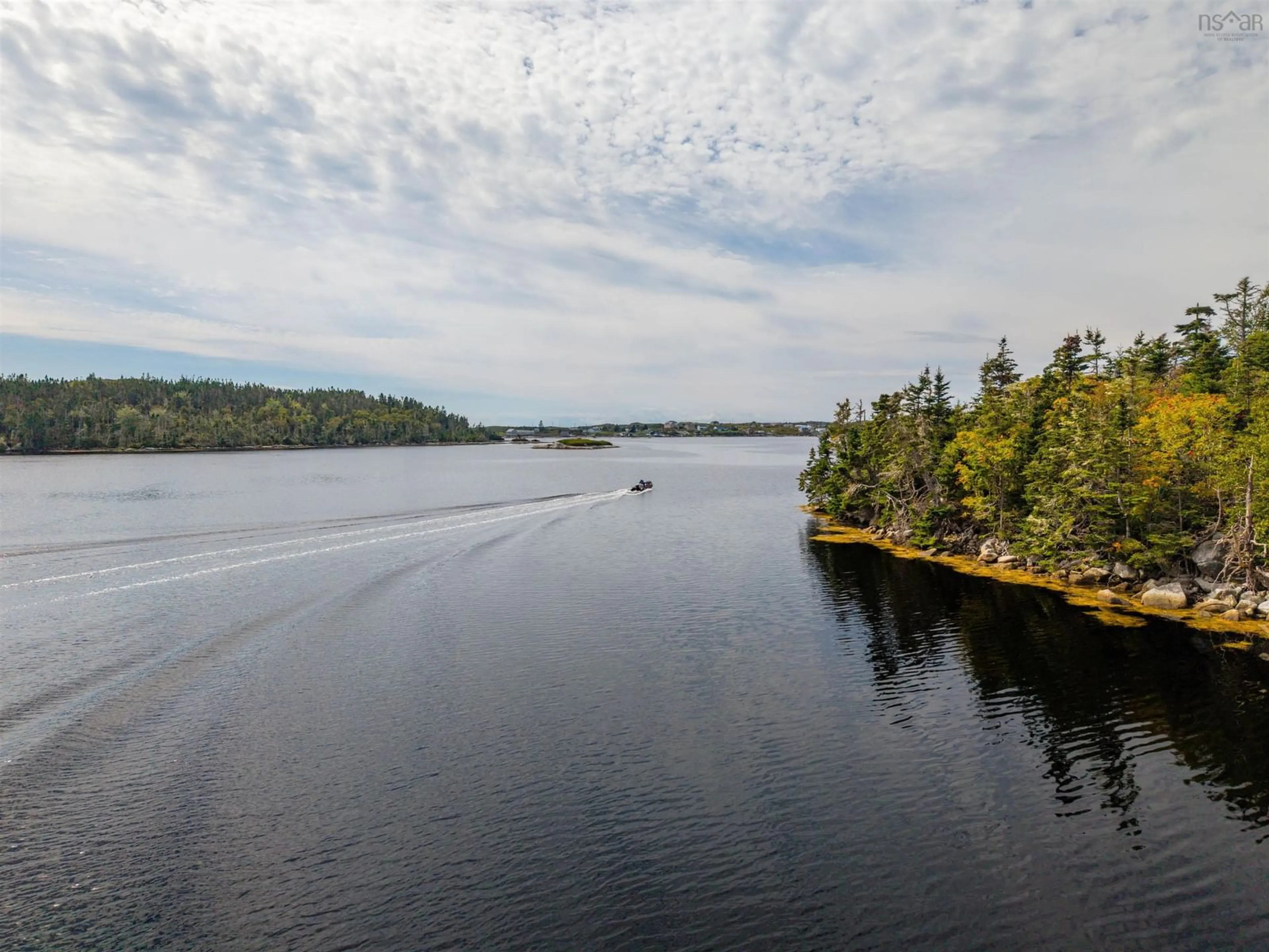 A pic from outside/outdoor area/front of a property/back of a property/a pic from drone, water/lake/river/ocean view for 257 East Dover Rd, East Dover Nova Scotia B3Z 3W4