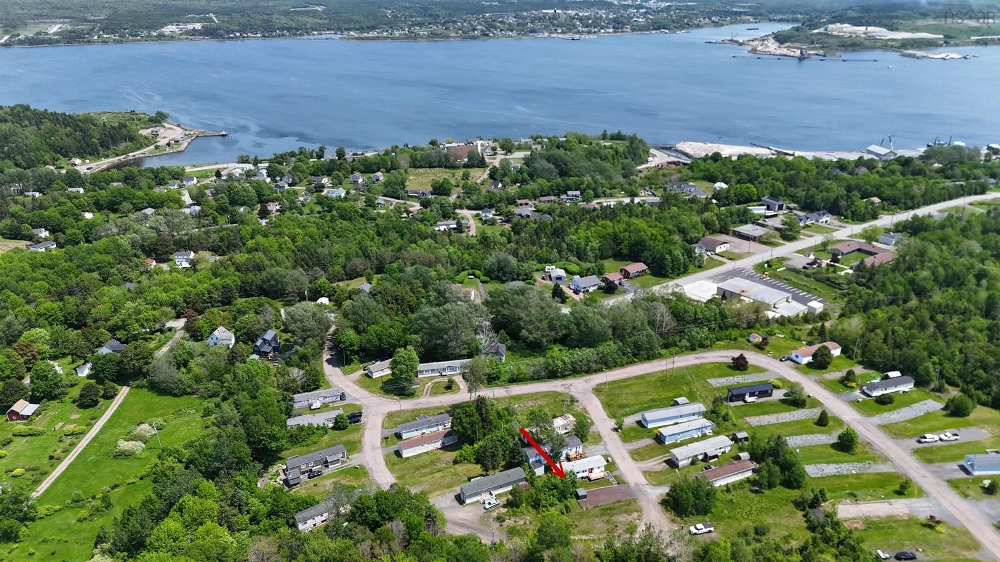 A pic from outside/outdoor area/front of a property/back of a property/a pic from drone, water/lake/river/ocean view for 99 Sheridan Drive, Mulgrave Nova Scotia B0E 2G0