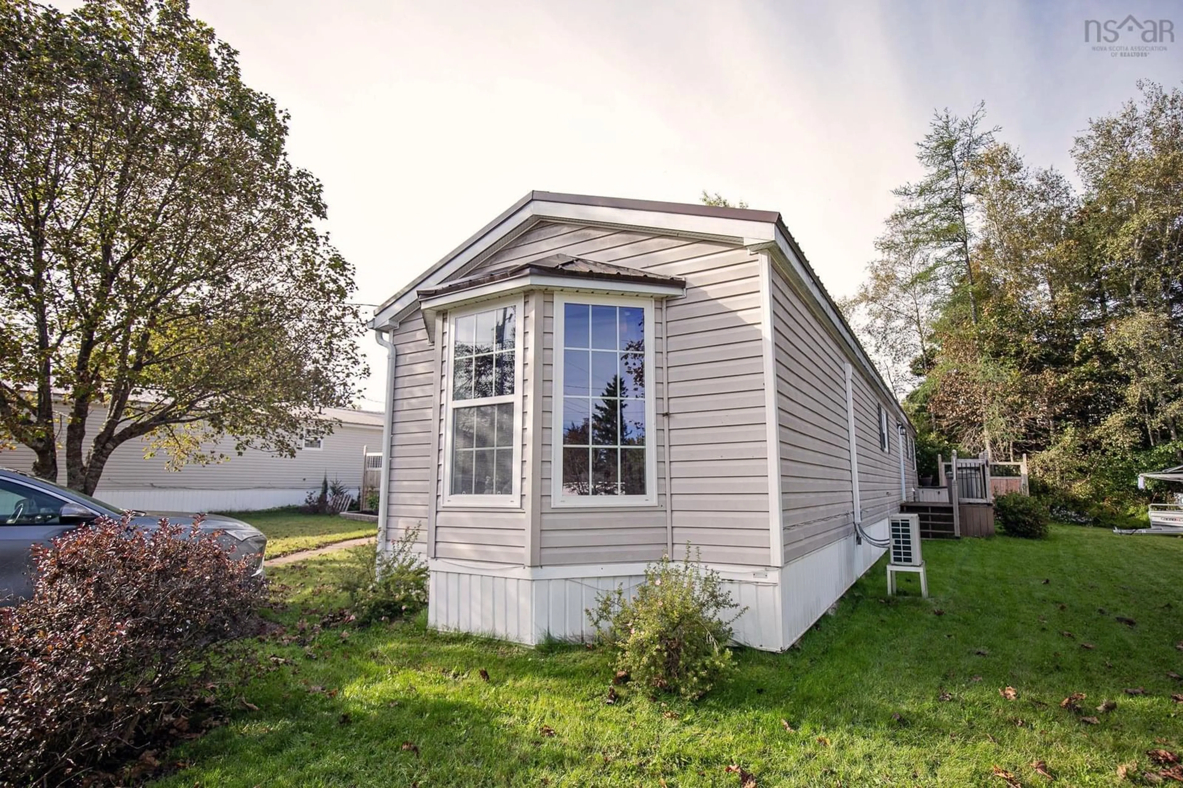 Home with vinyl exterior material, street for 12 Kent Dr, Amherst Nova Scotia B4H 4L3