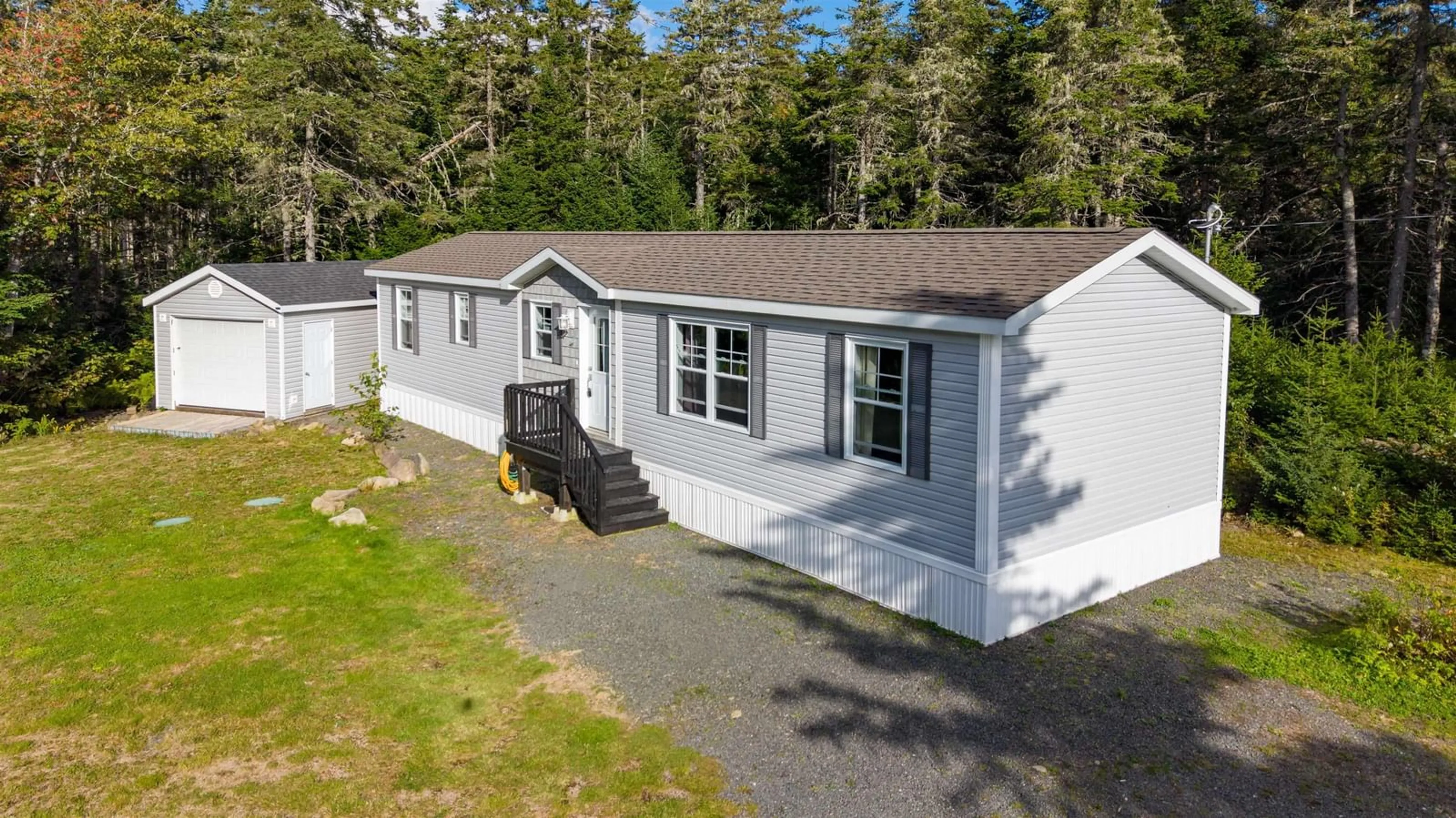 A pic from outside/outdoor area/front of a property/back of a property/a pic from drone, street for 73 Church Rd, Ross Ferry Nova Scotia B0E 1B0