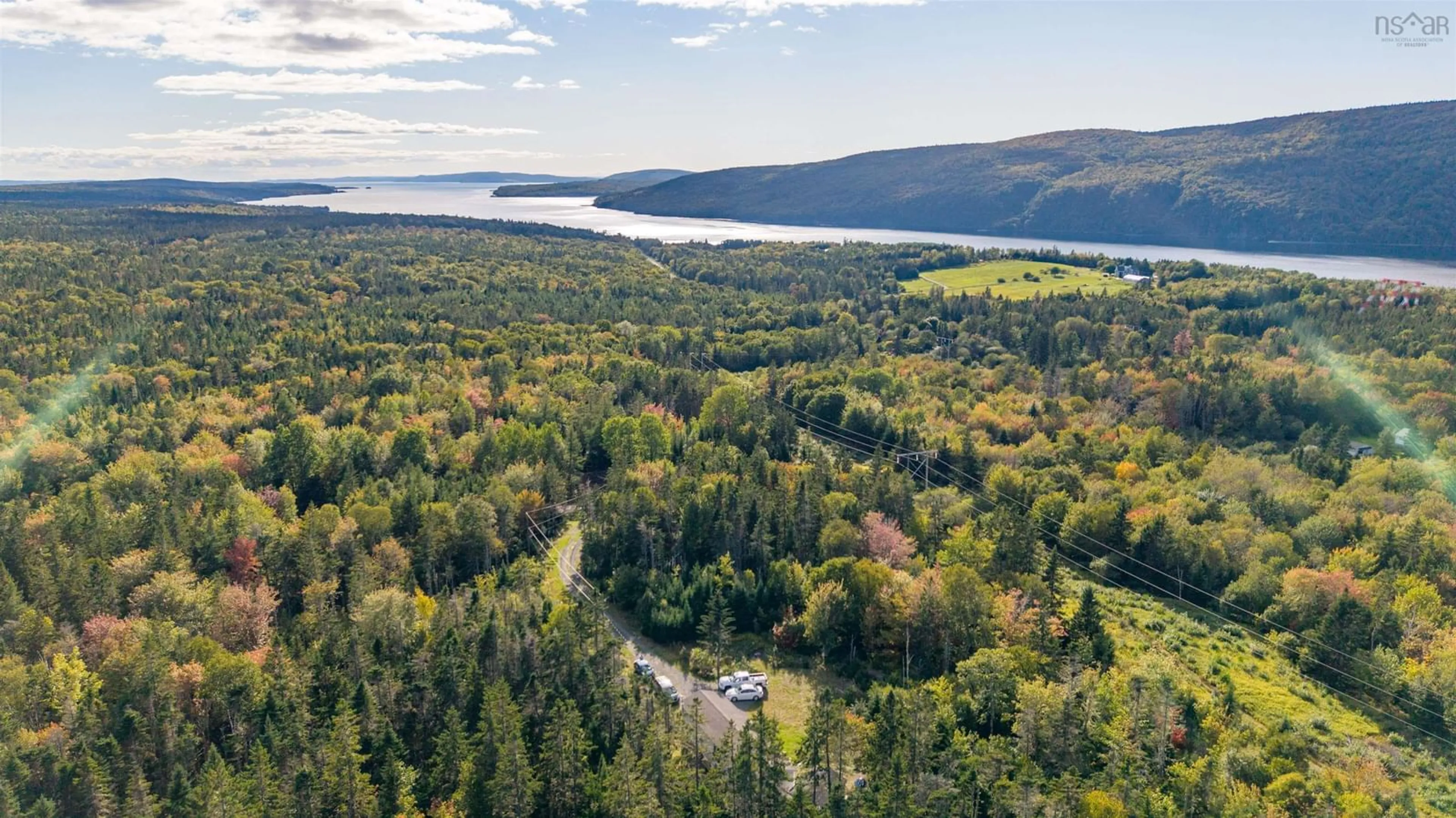 A pic from outside/outdoor area/front of a property/back of a property/a pic from drone, water/lake/river/ocean view for 73 Church Rd, Ross Ferry Nova Scotia B0E 1B0