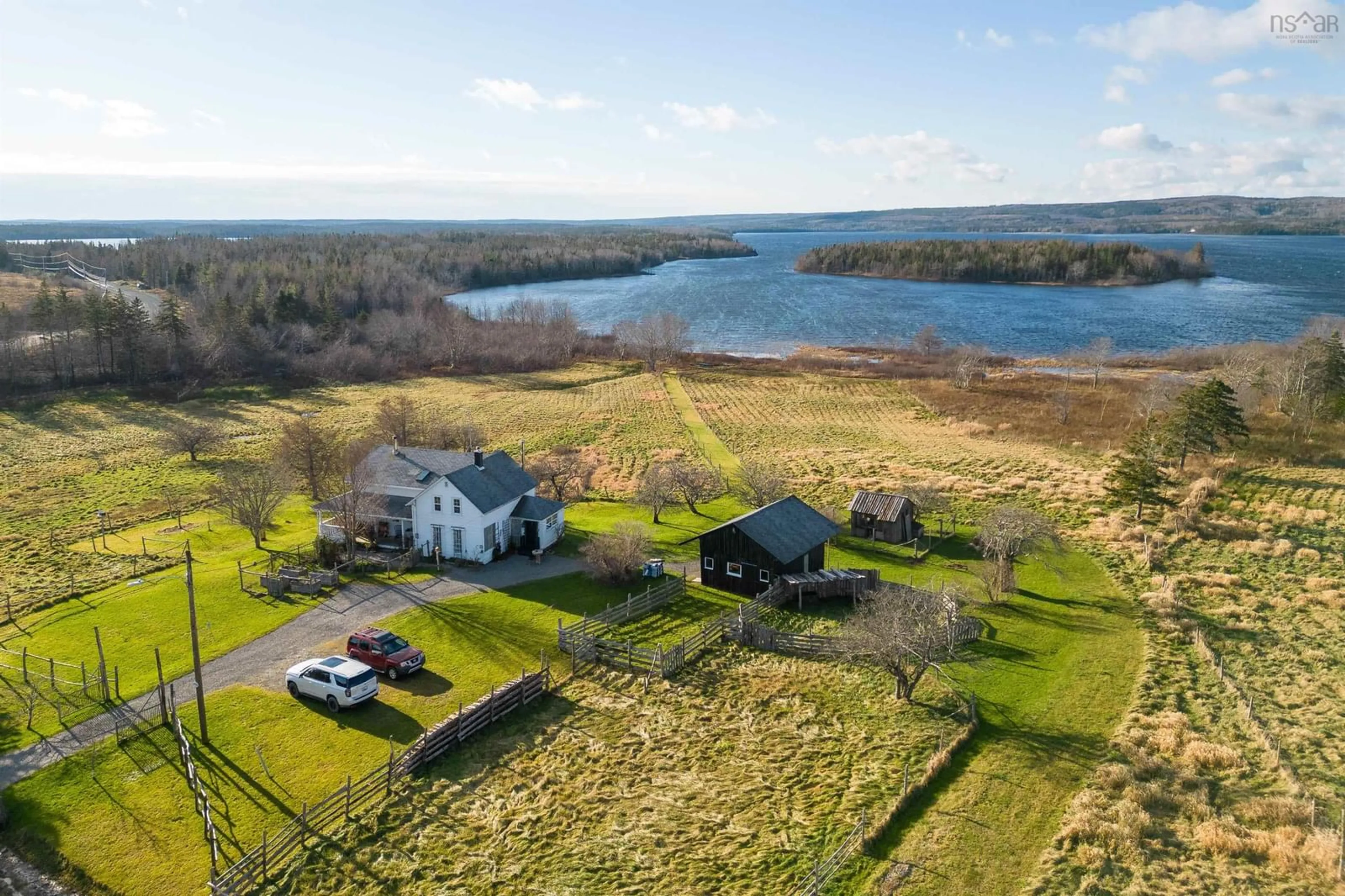 A pic from outside/outdoor area/front of a property/back of a property/a pic from drone, water/lake/river/ocean view for 2660 Loch Lomond Rd, Enon Nova Scotia B1J 1W8