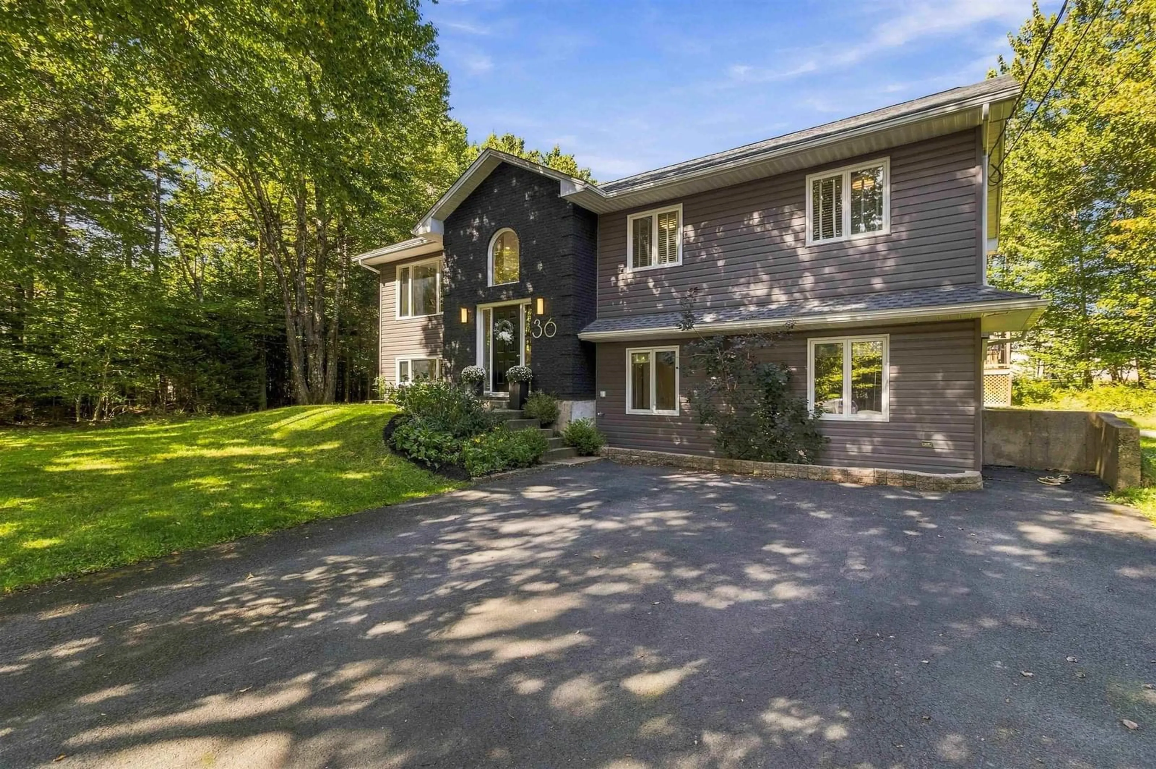 A pic from outside/outdoor area/front of a property/back of a property/a pic from drone, street for 36 Sime Crt, Hammonds Plains Nova Scotia B4B 1K1