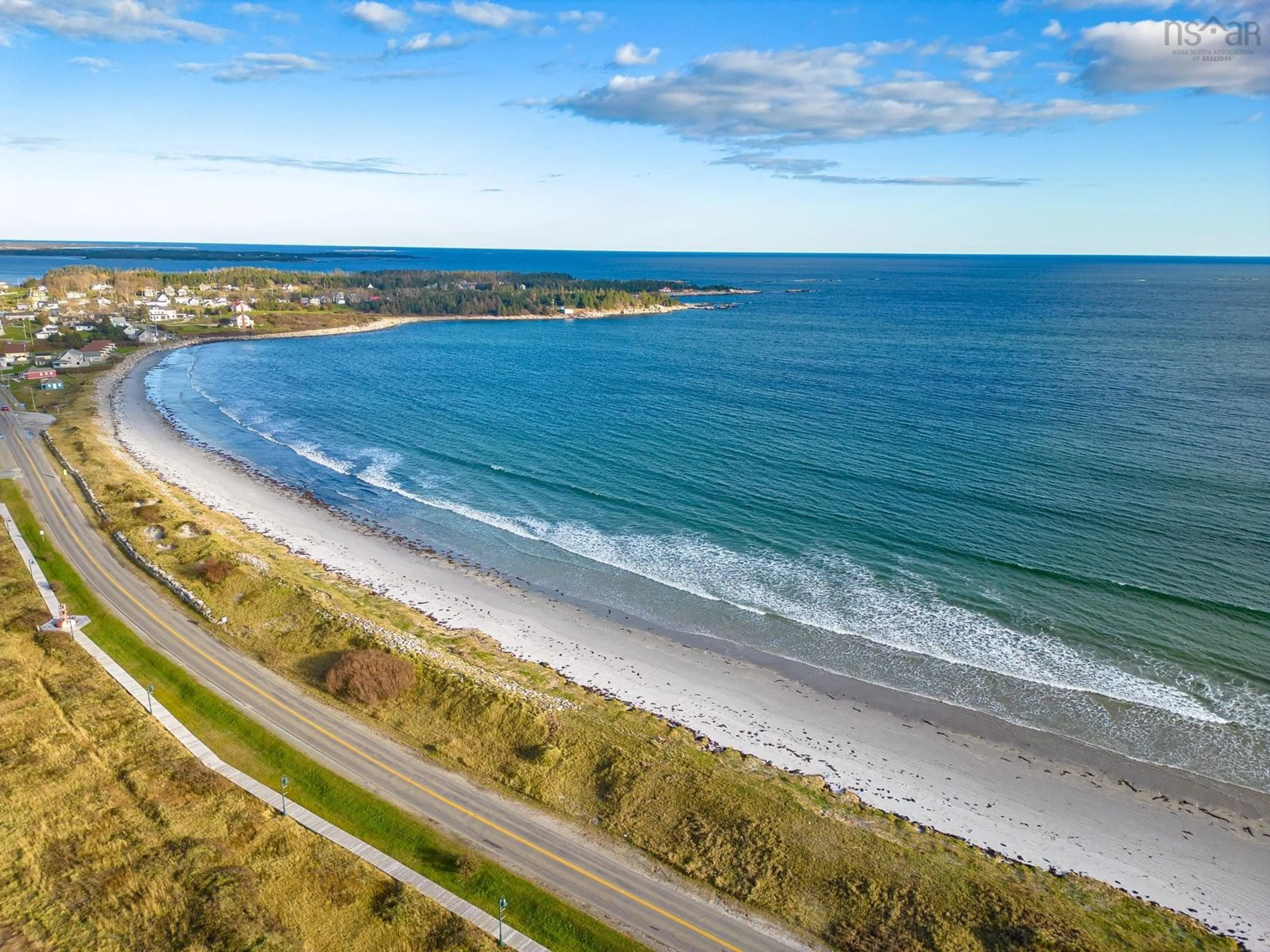 A pic from outside/outdoor area/front of a property/back of a property/a pic from drone, water/lake/river/ocean view for 20 North St, Lockeport Nova Scotia B0T 1L0