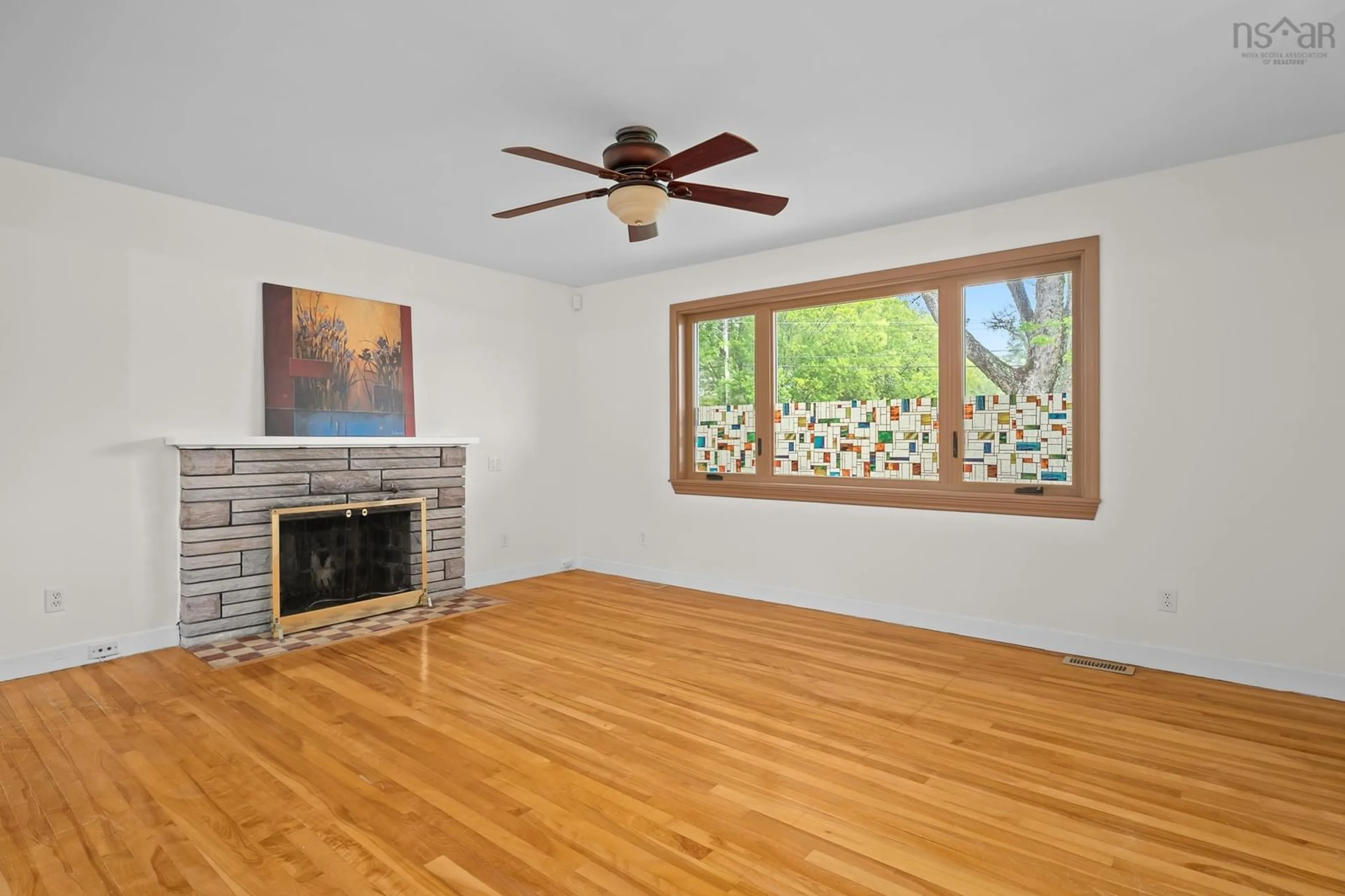 Living room with furniture, wood/laminate floor for 9 Brookhouse Rd, Dartmouth Nova Scotia B2W 1W5