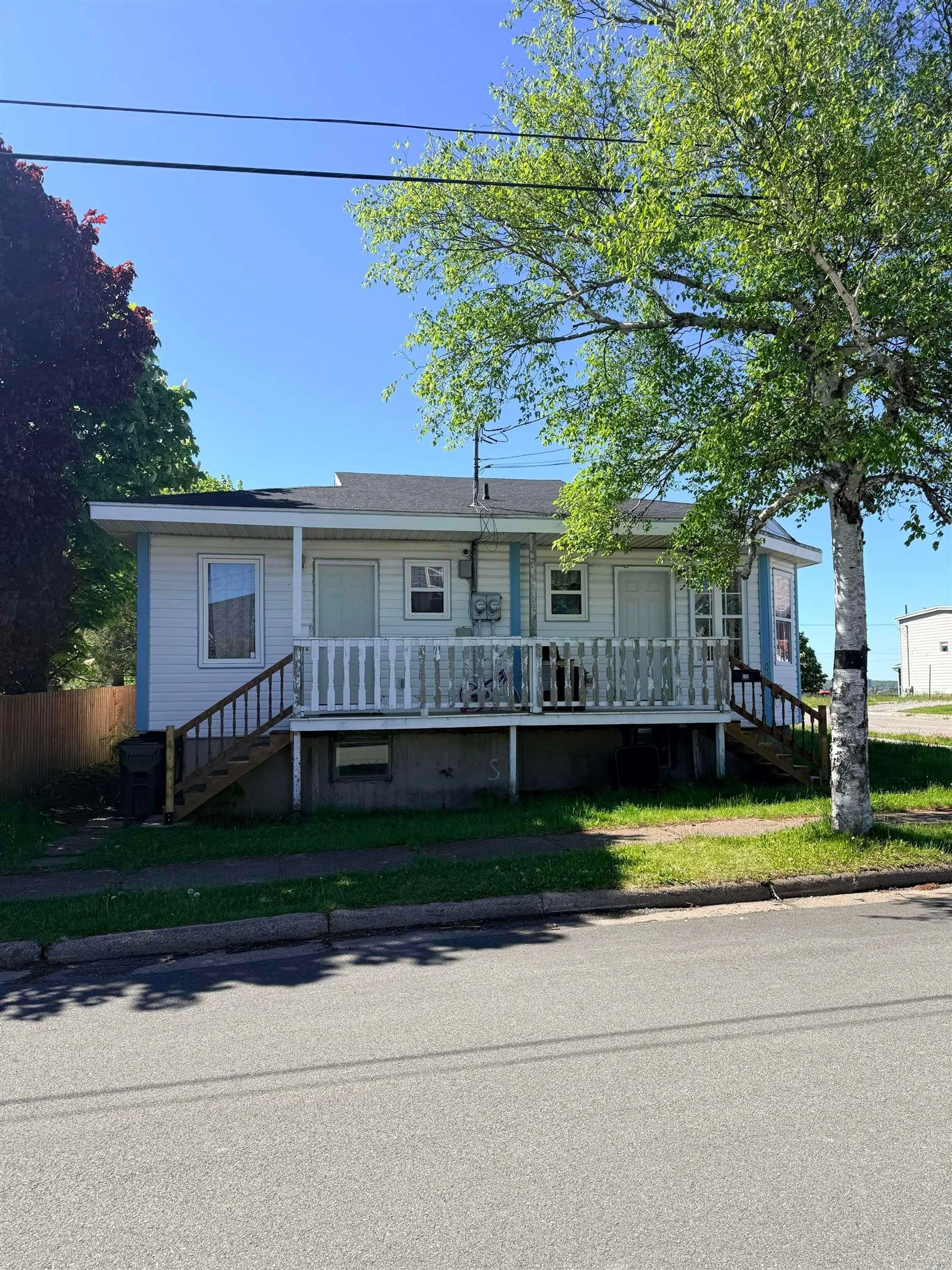 Home with vinyl exterior material, street for 100-102 Henry Street St, Sydney Nova Scotia B1N 2H3