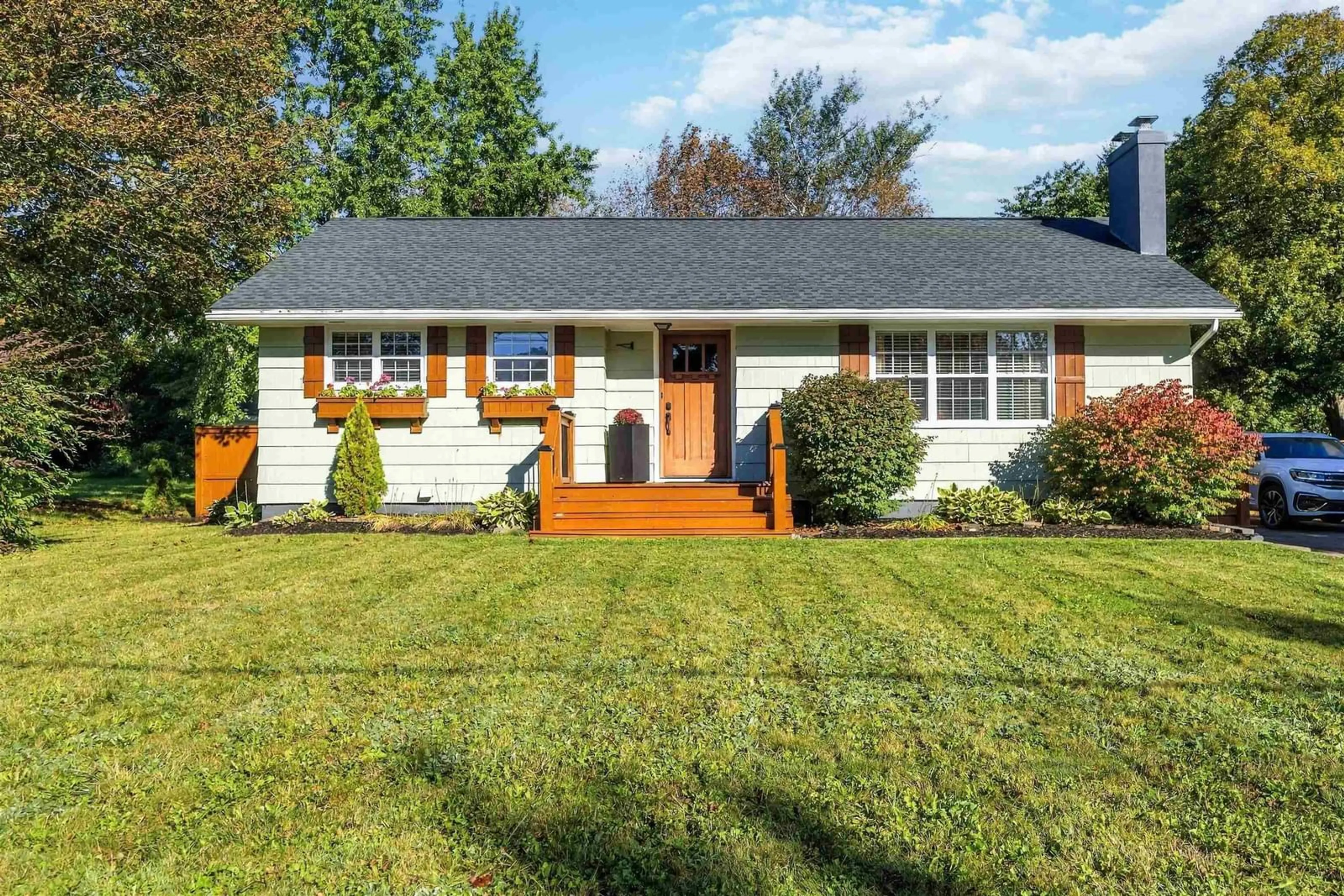 Home with vinyl exterior material, street for 1023 High Street, Port Williams Nova Scotia B0P 1T0