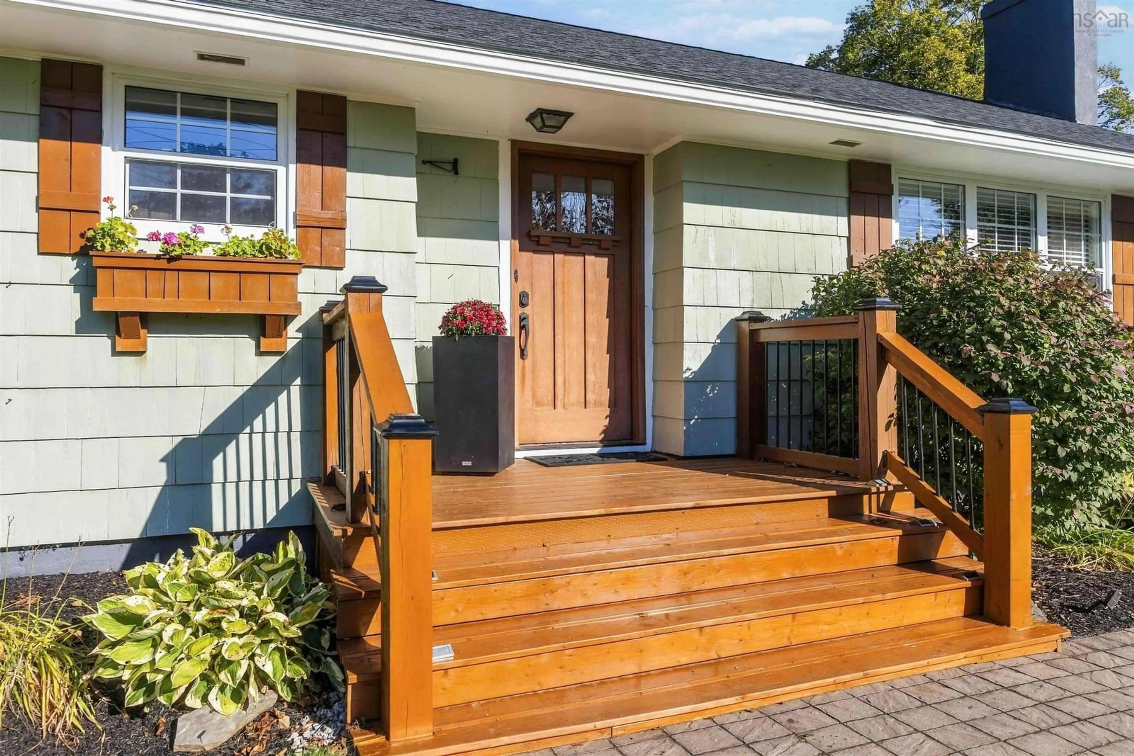 Home with vinyl exterior material, street for 1023 High Street, Port Williams Nova Scotia B0P 1T0