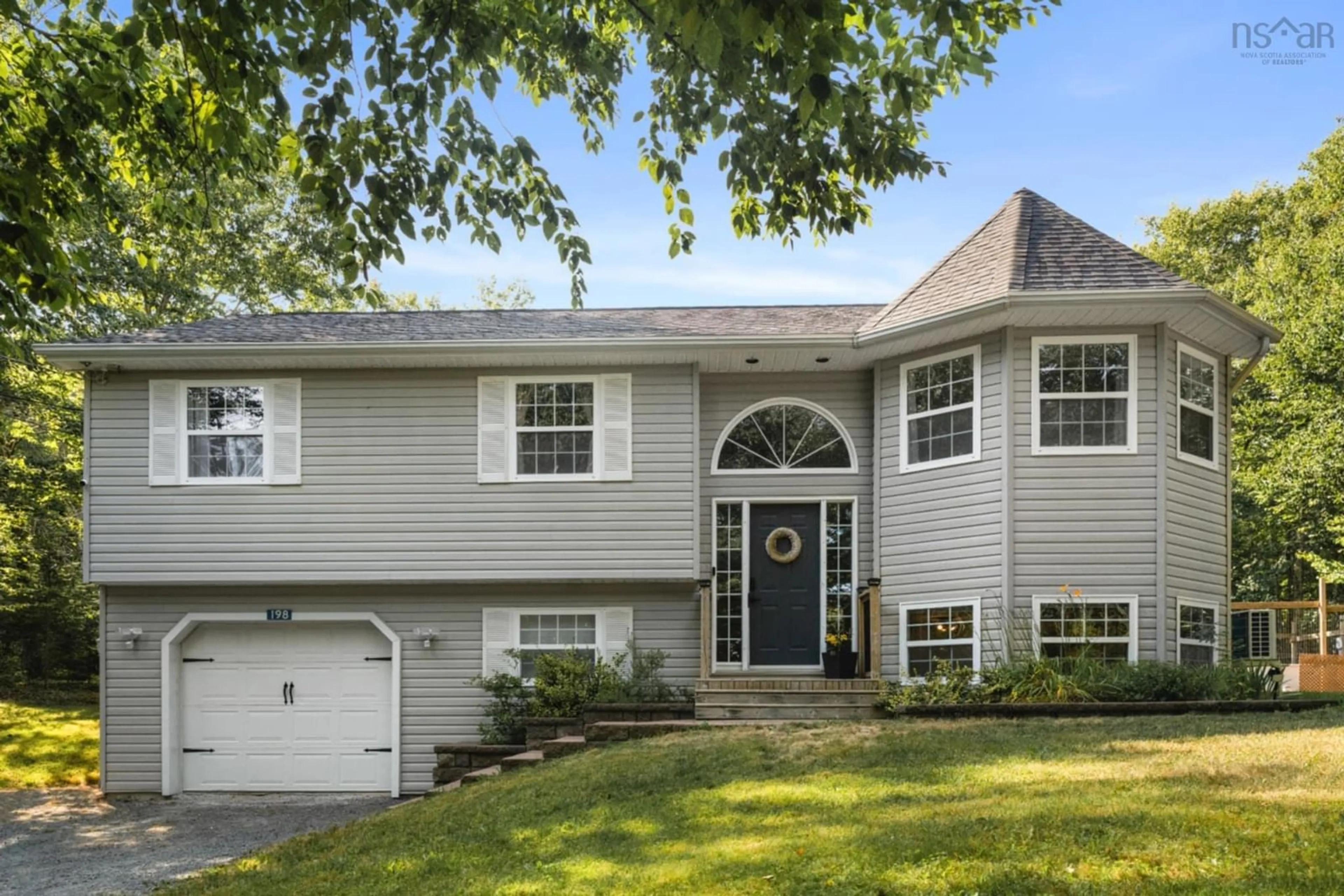 Home with vinyl exterior material, street for 198 Tattenham Cres, Hammonds Plains Nova Scotia B4B 1V2