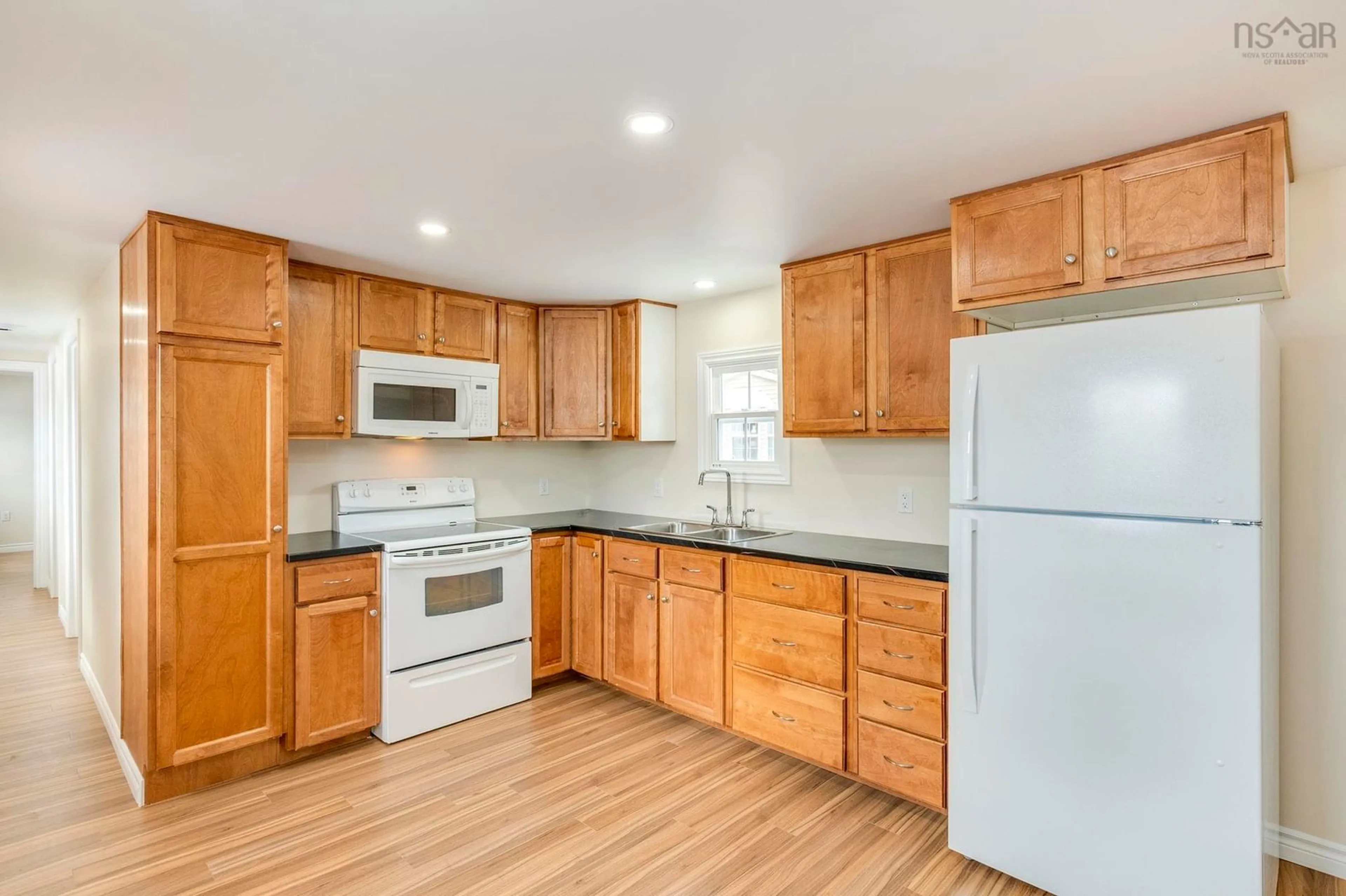 Standard kitchen, wood/laminate floor for 39 Beattie Drive, Windermere Nova Scotia B0P 1E0