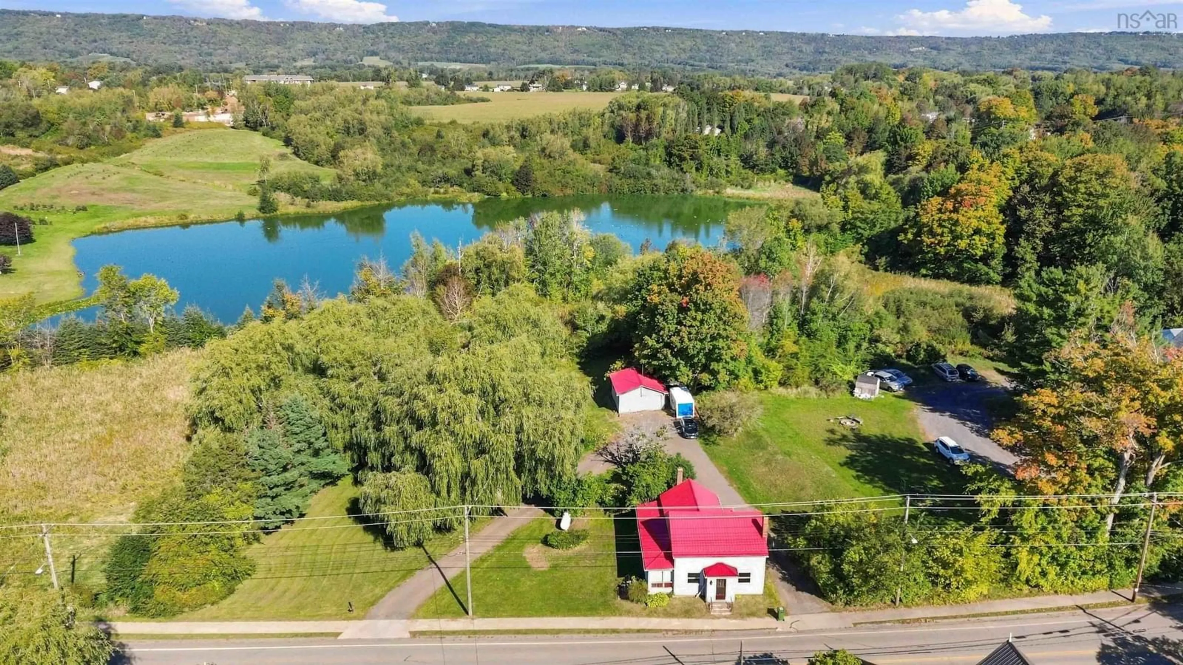 A pic from outside/outdoor area/front of a property/back of a property/a pic from drone, water/lake/river/ocean view for 9677 221 Hwy, Canning Nova Scotia B0S 1P0