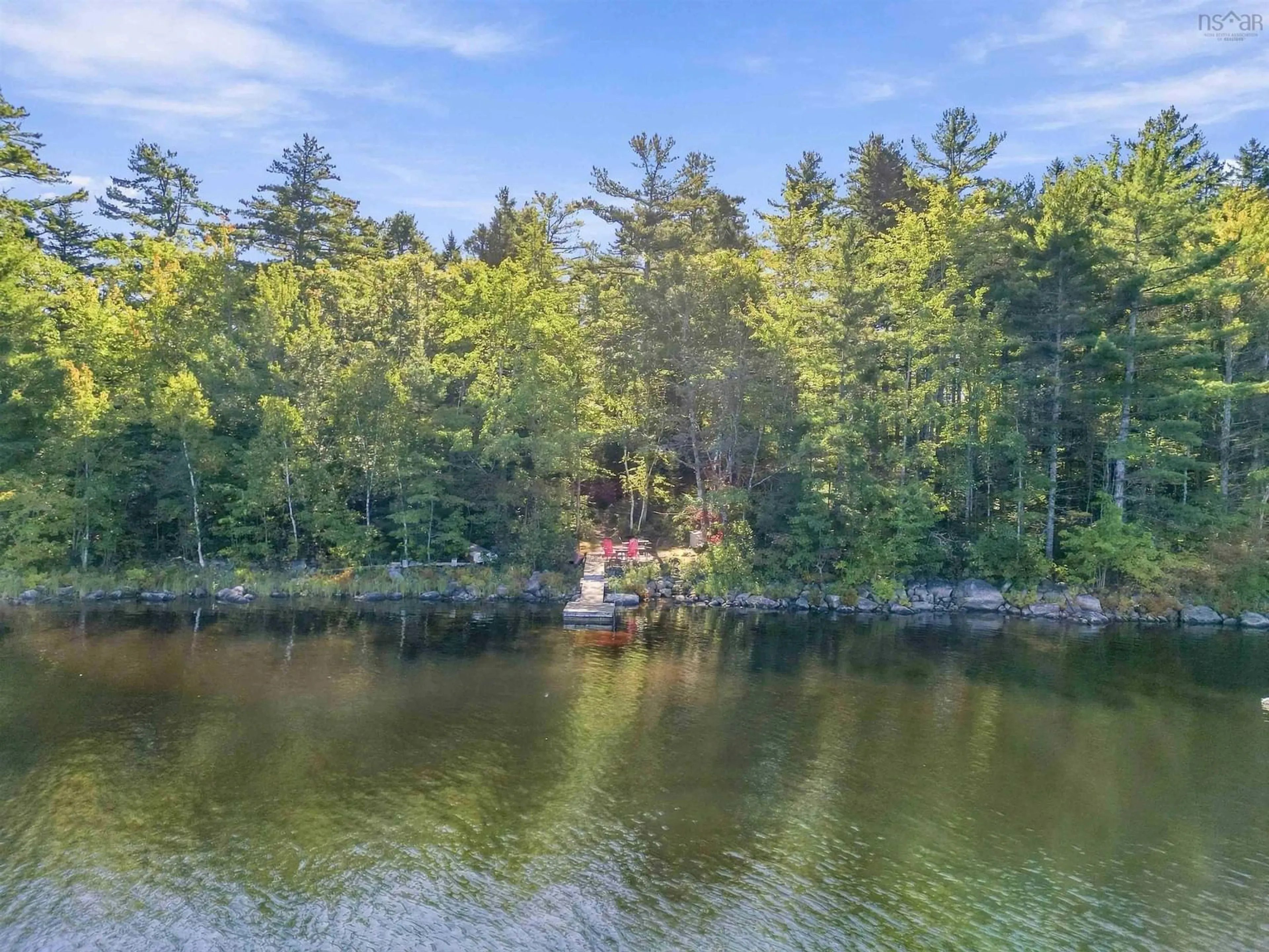 A pic from outside/outdoor area/front of a property/back of a property/a pic from drone, water/lake/river/ocean view for 191 Beach Point Rd, Newburne Nova Scotia B0R 1A0