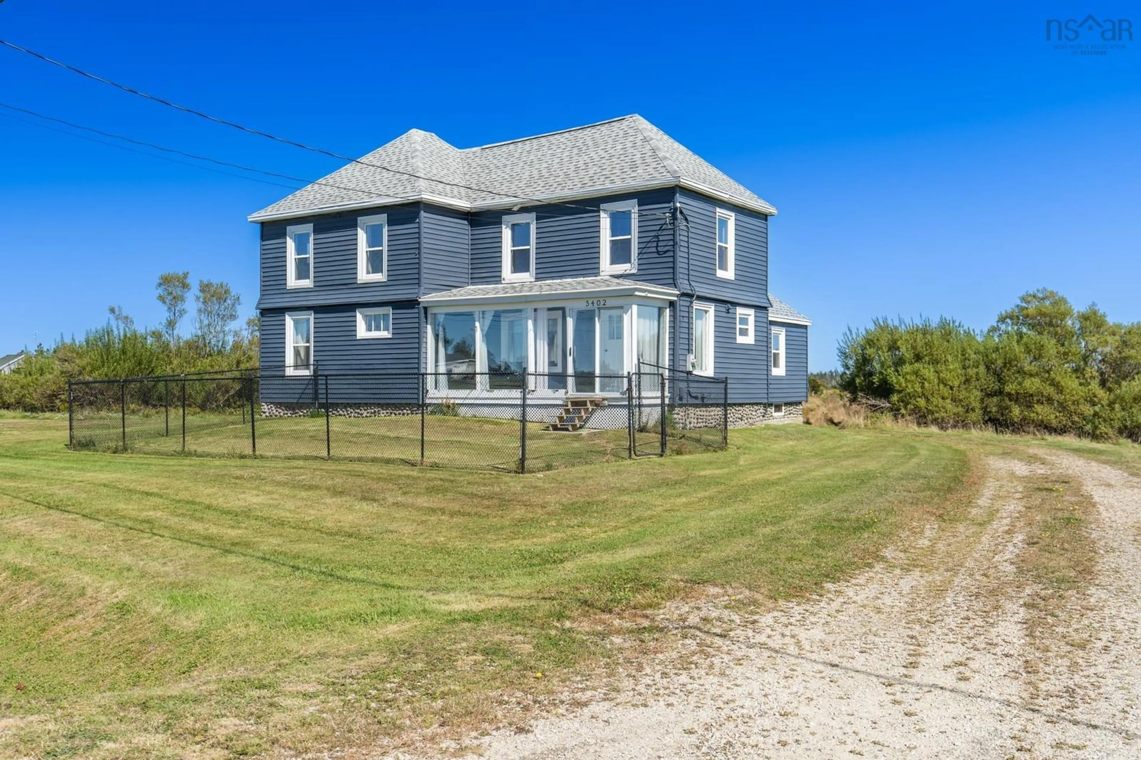 A pic from outside/outdoor area/front of a property/back of a property/a pic from drone, unknown for 5402 Highway 1, Salmon River Nova Scotia B5A 5B3