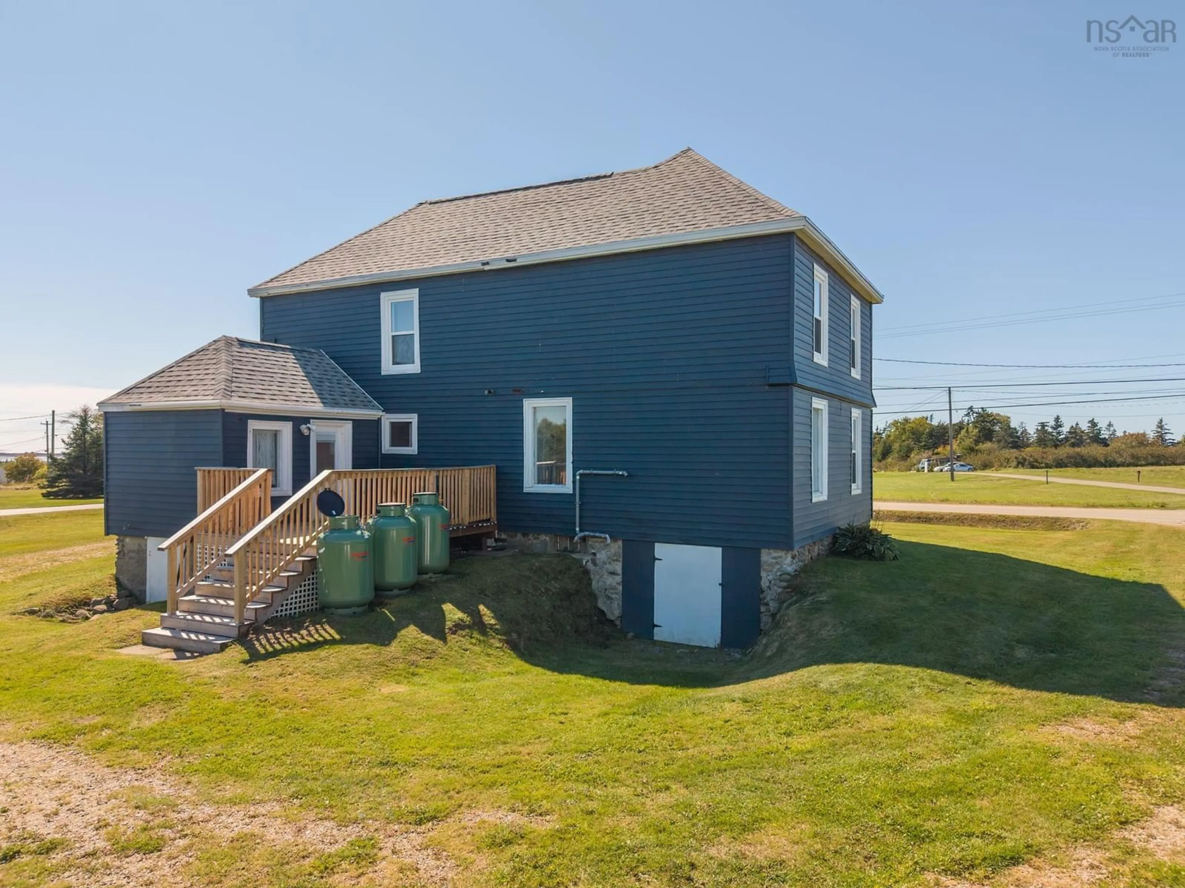 A pic from outside/outdoor area/front of a property/back of a property/a pic from drone, water/lake/river/ocean view for 5402 Highway 1, Salmon River Nova Scotia B5A 5B3