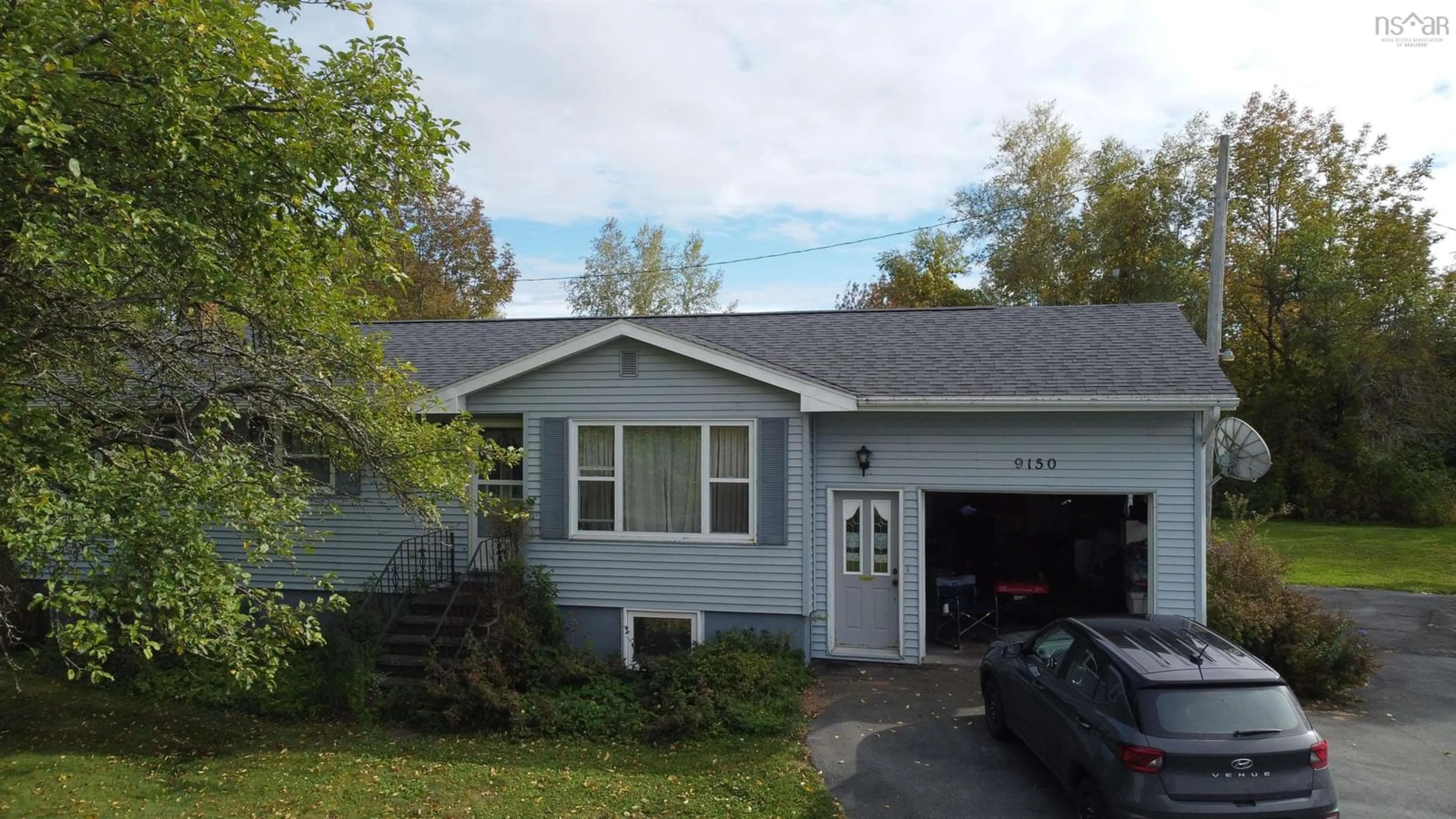 Home with vinyl exterior material, street for 9150 Highway 14, Woodville Nova Scotia B0N 2A0