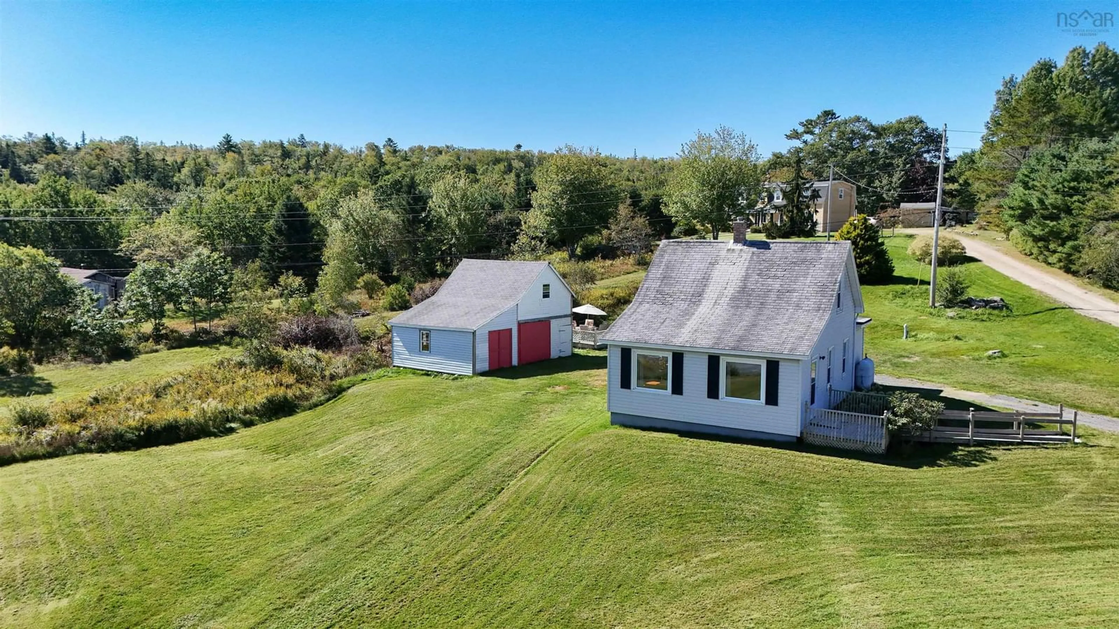 A pic from outside/outdoor area/front of a property/back of a property/a pic from drone, water/lake/river/ocean view for 150 Highway 329, Fox Point Nova Scotia B0J 1T0
